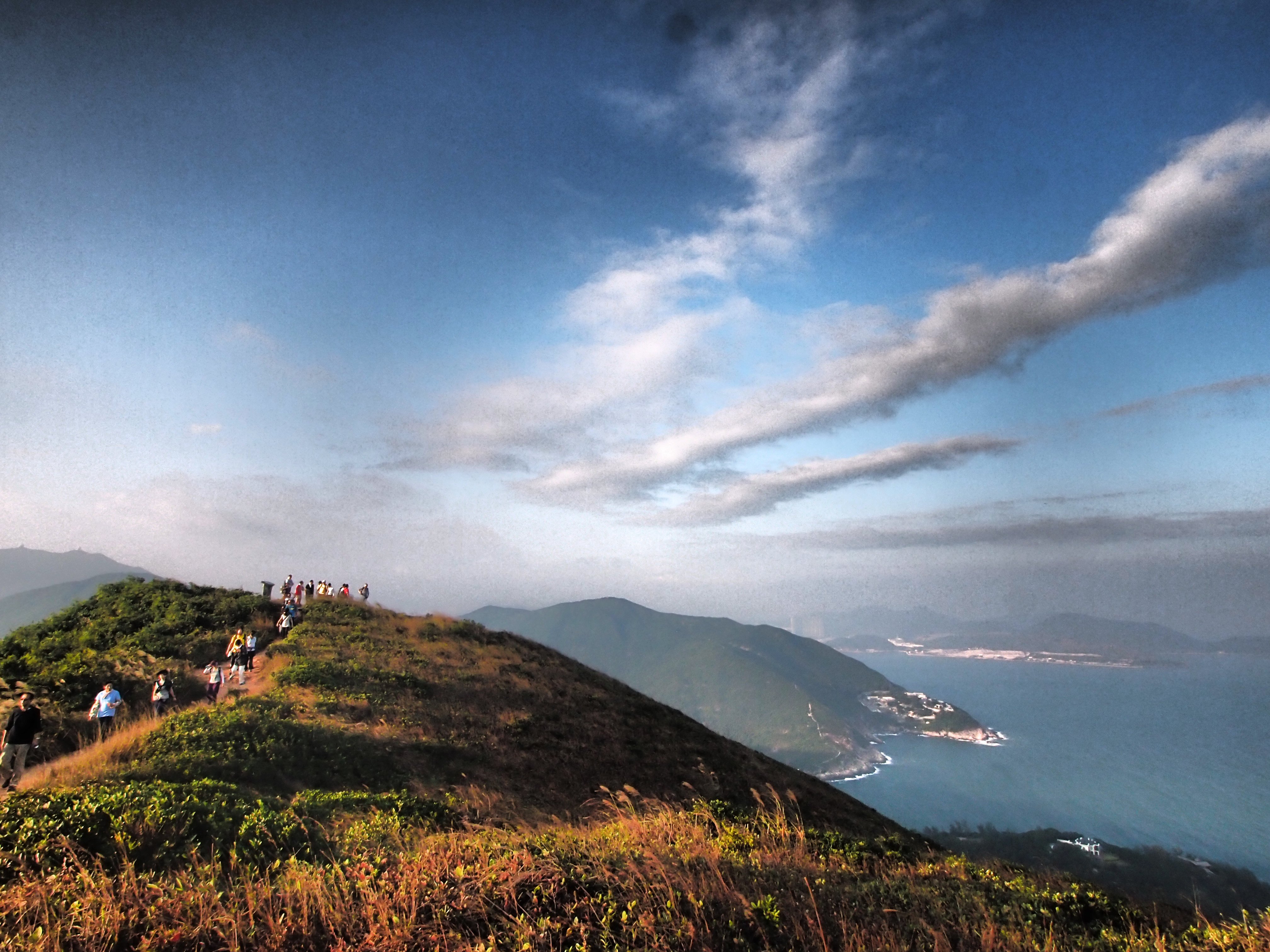 Hikers walking the Dragon’s Back trail, in Shek O, Hong Kong.