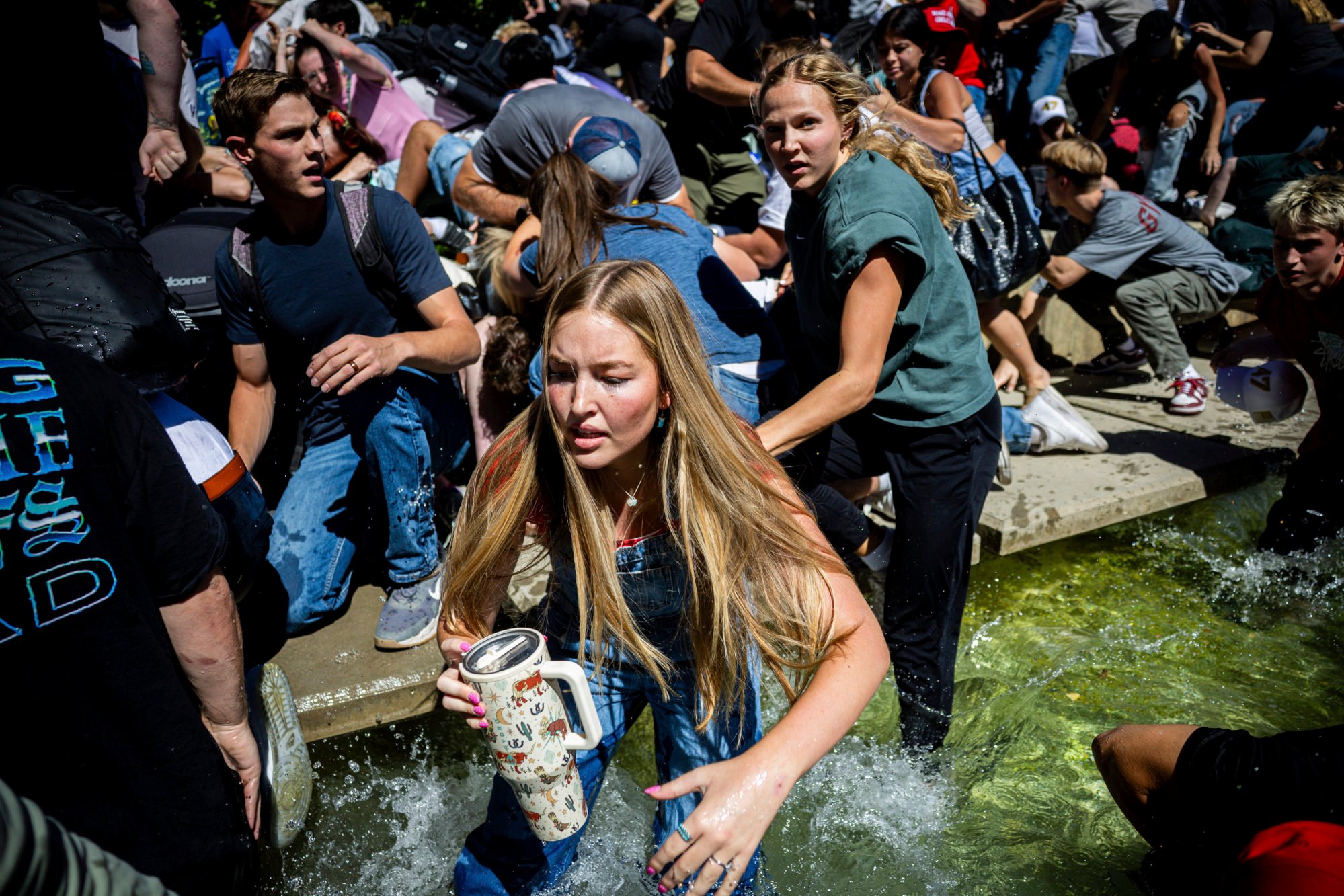 People scatter after Charlie Kirk was shot. Photo: The Deseret News via AP