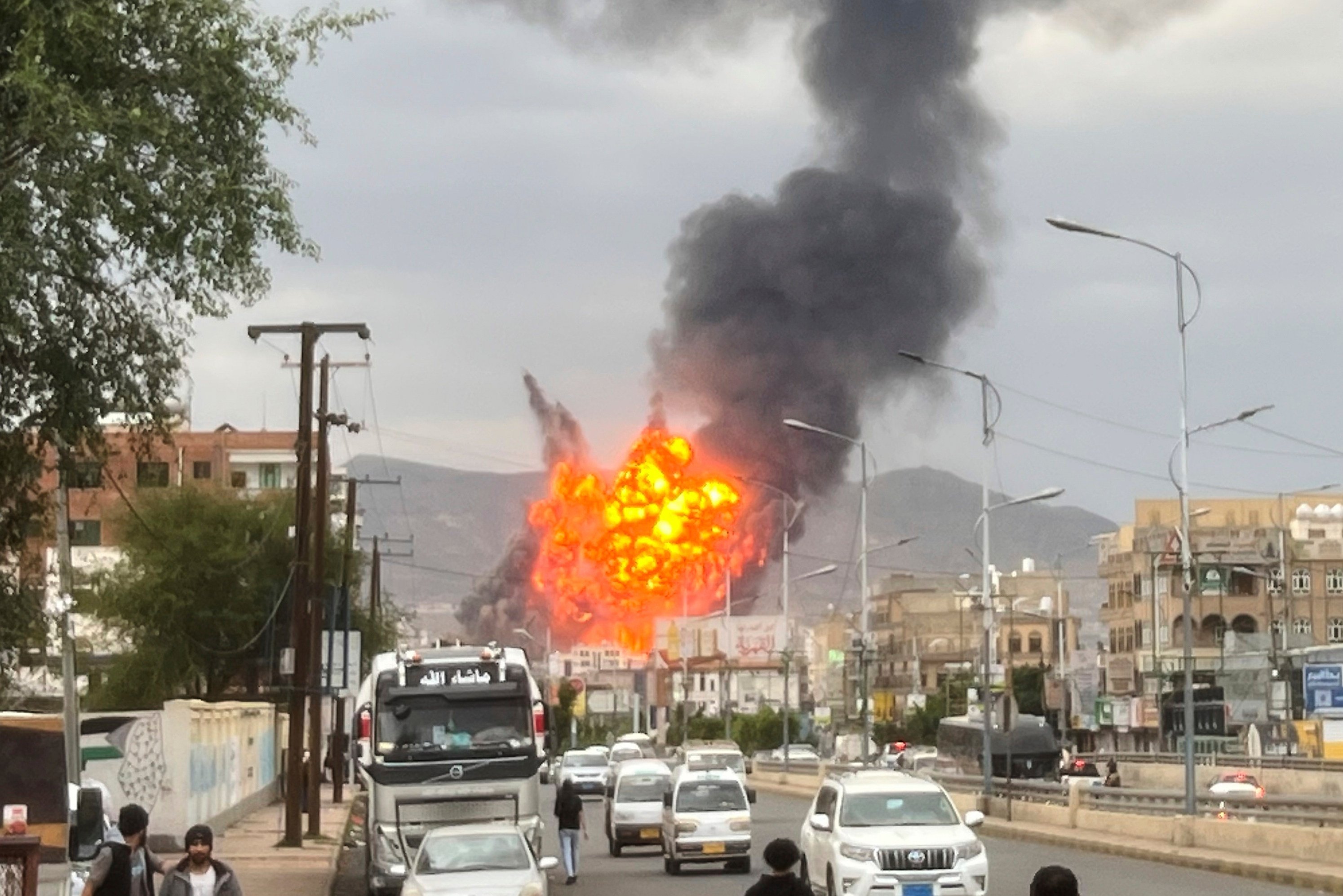 Flames and smoke rise following Israeli air strikes in Sanaa, Yemen, on Wednesday. Photo: AP