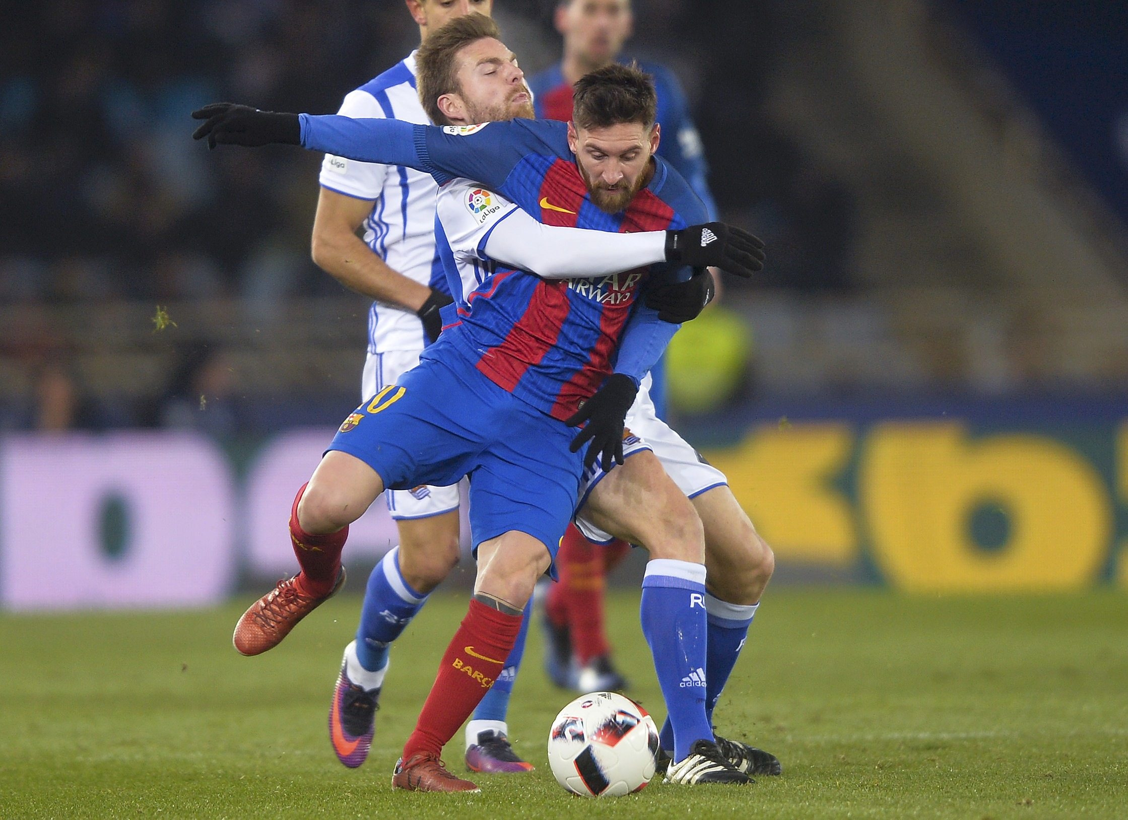 Asier Illarramendi (left), then with Real Sociedad, grappling with Barcelona’s Lionel Messi in a 2017 Spanish King’s Cup match. Photo: Reuters