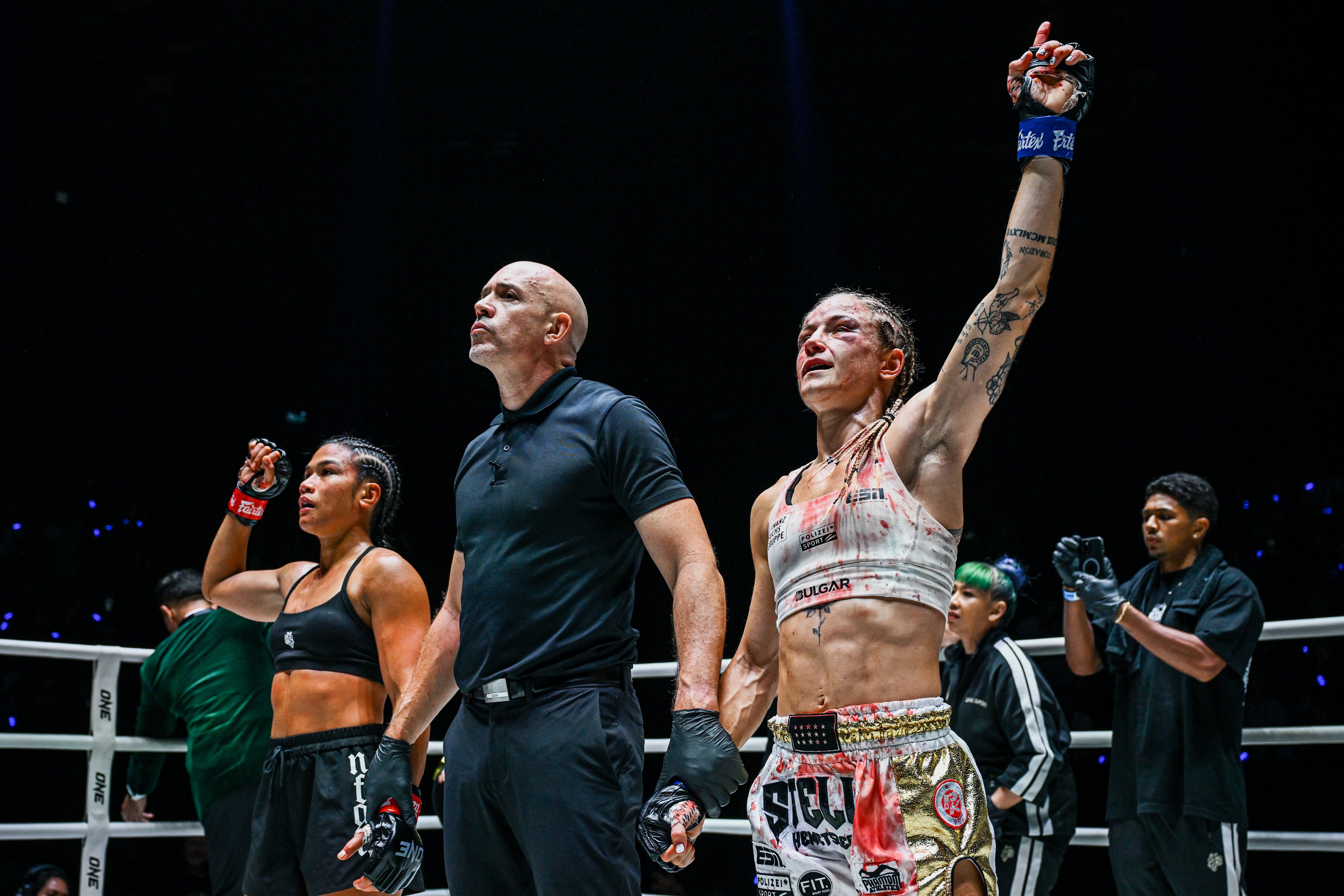 Stella Hemetsberger (righjt) beat Jackie Buntan at ONE Fight Night 35 in Bangkok to become the ONE strawweight Muay Thai world champion. Photo: ONE Championship