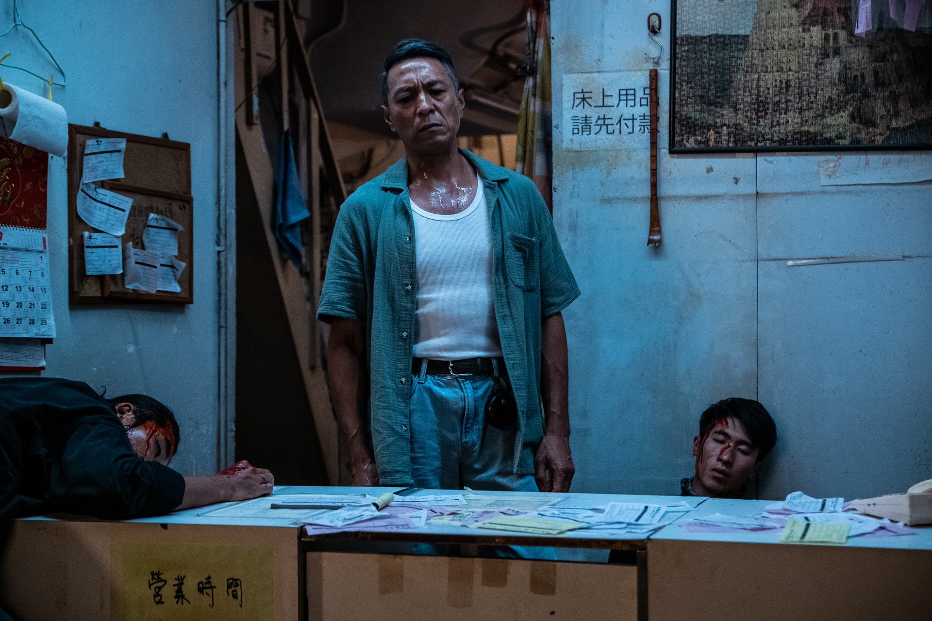 Philip Keung in a still from The Remnant (category IIB, Cantonese), directed by Kwan Man-hin. Fish Liew and Ling Man-lung co-star.