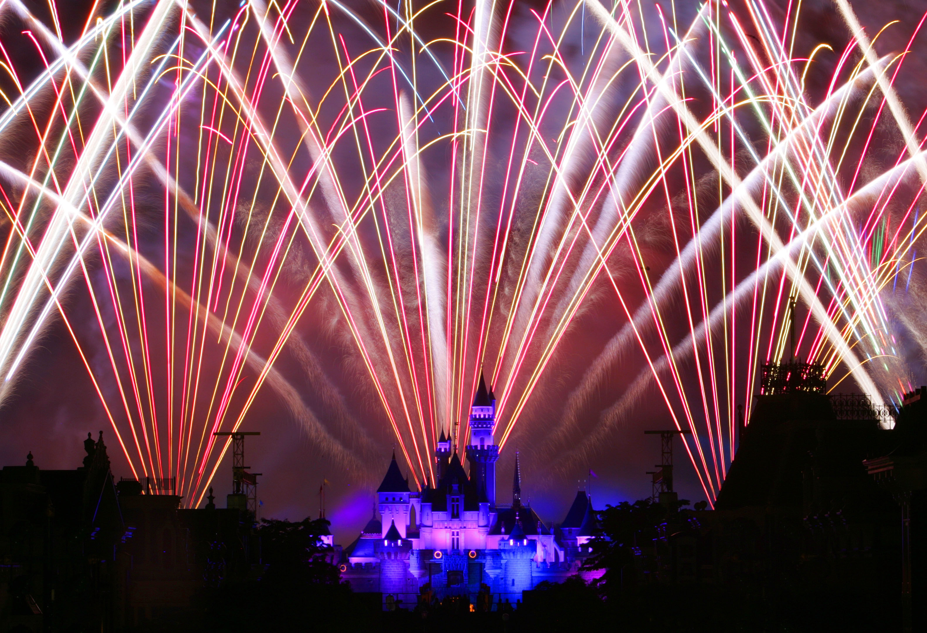 Fireworks light up the night sky over the Sleeping Beauty Castle in Hong Kong Disneyland after the theme park opened on September 12, 2005. File photo: AP
