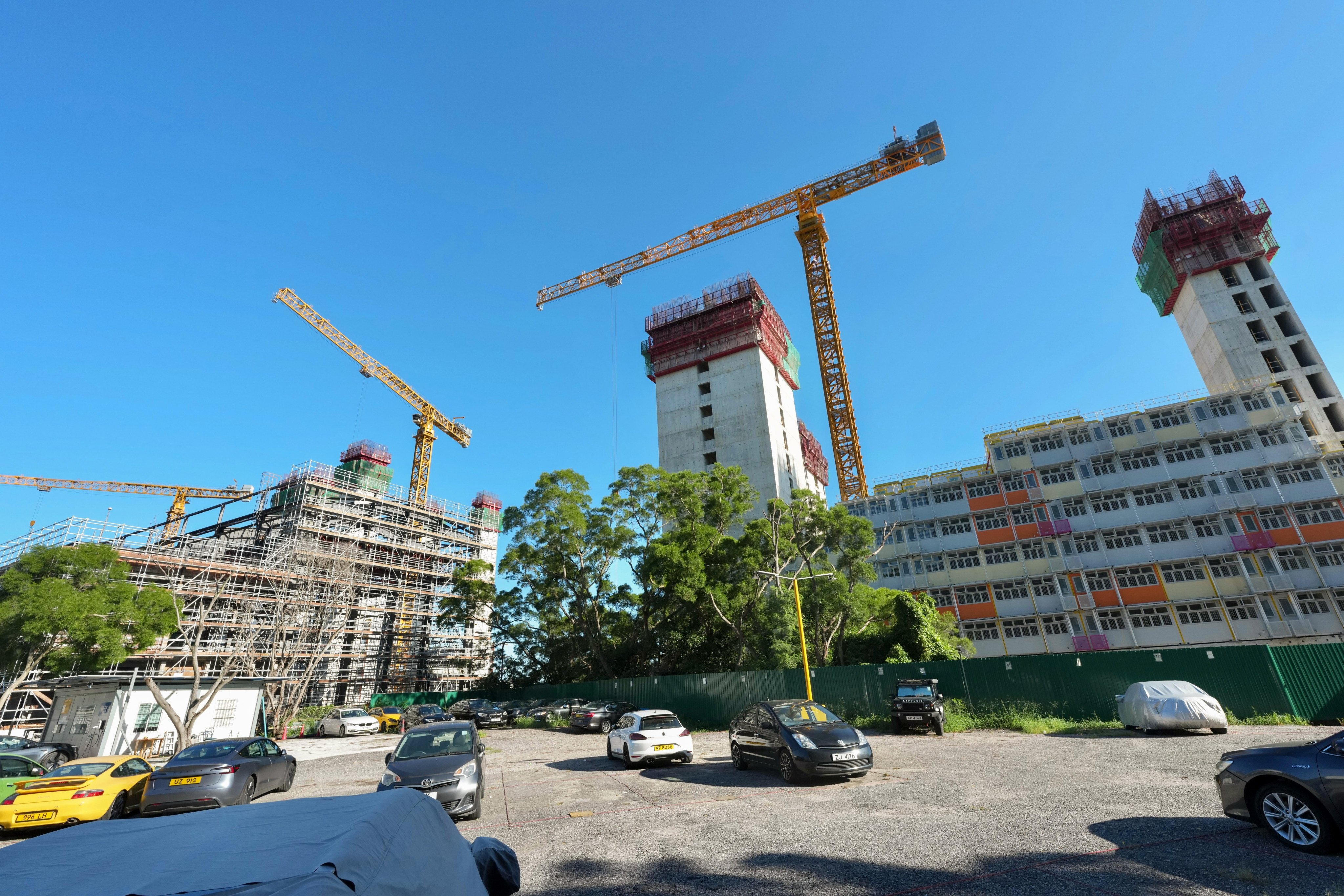 Authorities say screws have been cut without permission at a temporary public housing project in Siu Lam. Photo: Karma Lo