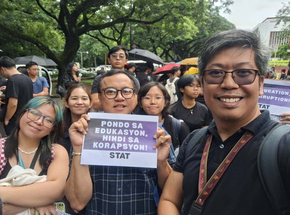 Raymond Macapagal poses with his students at Friday’s walkout at the University of the Philippines. Photo: Raymond Macapagal