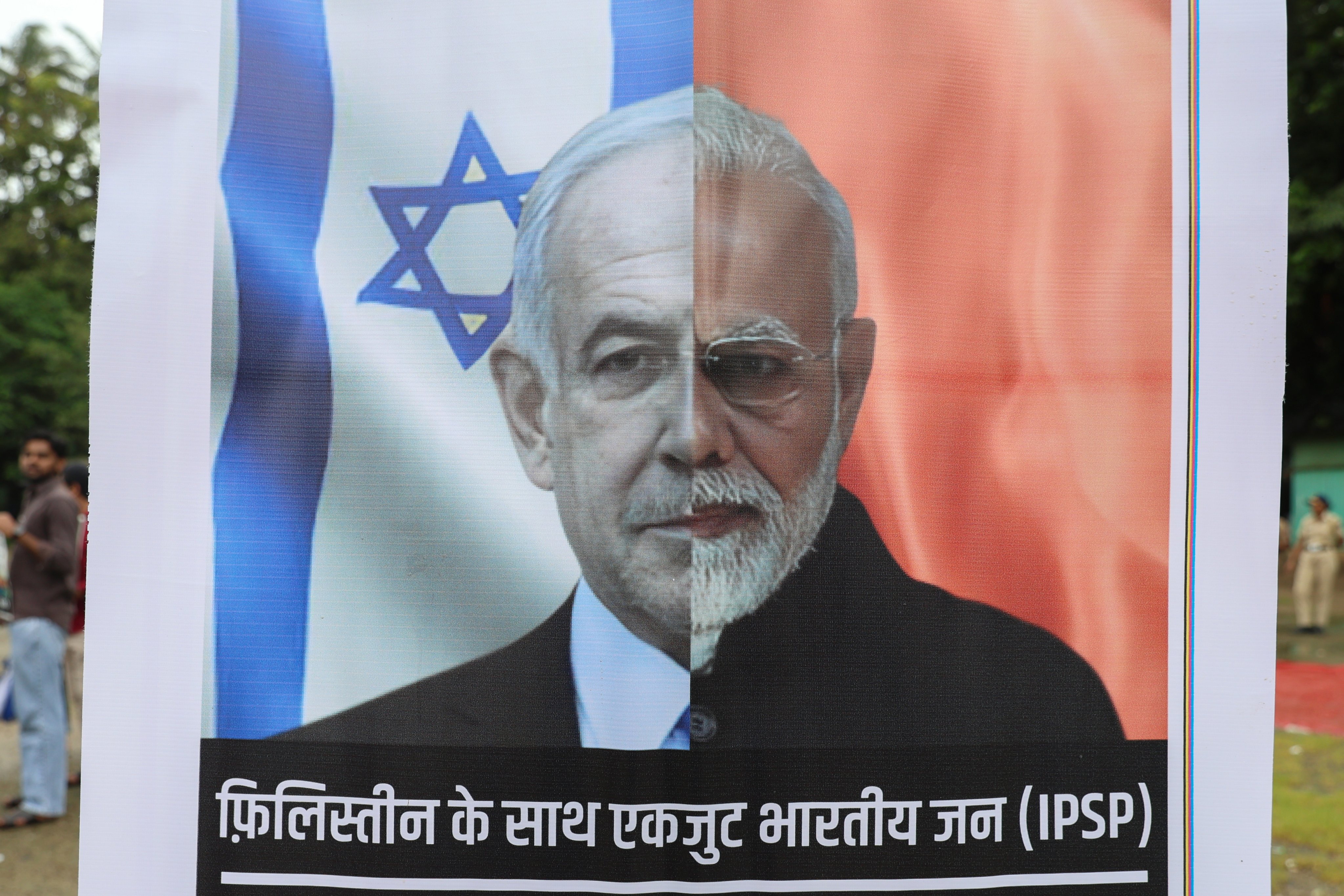 Protesters attending a pro-Palestinian rally in Mumbai last month hold a poster showing Israeli Prime Minister Benjamin Netanyahu and Indian Prime Minister Narendra Modi. Photo: EPA