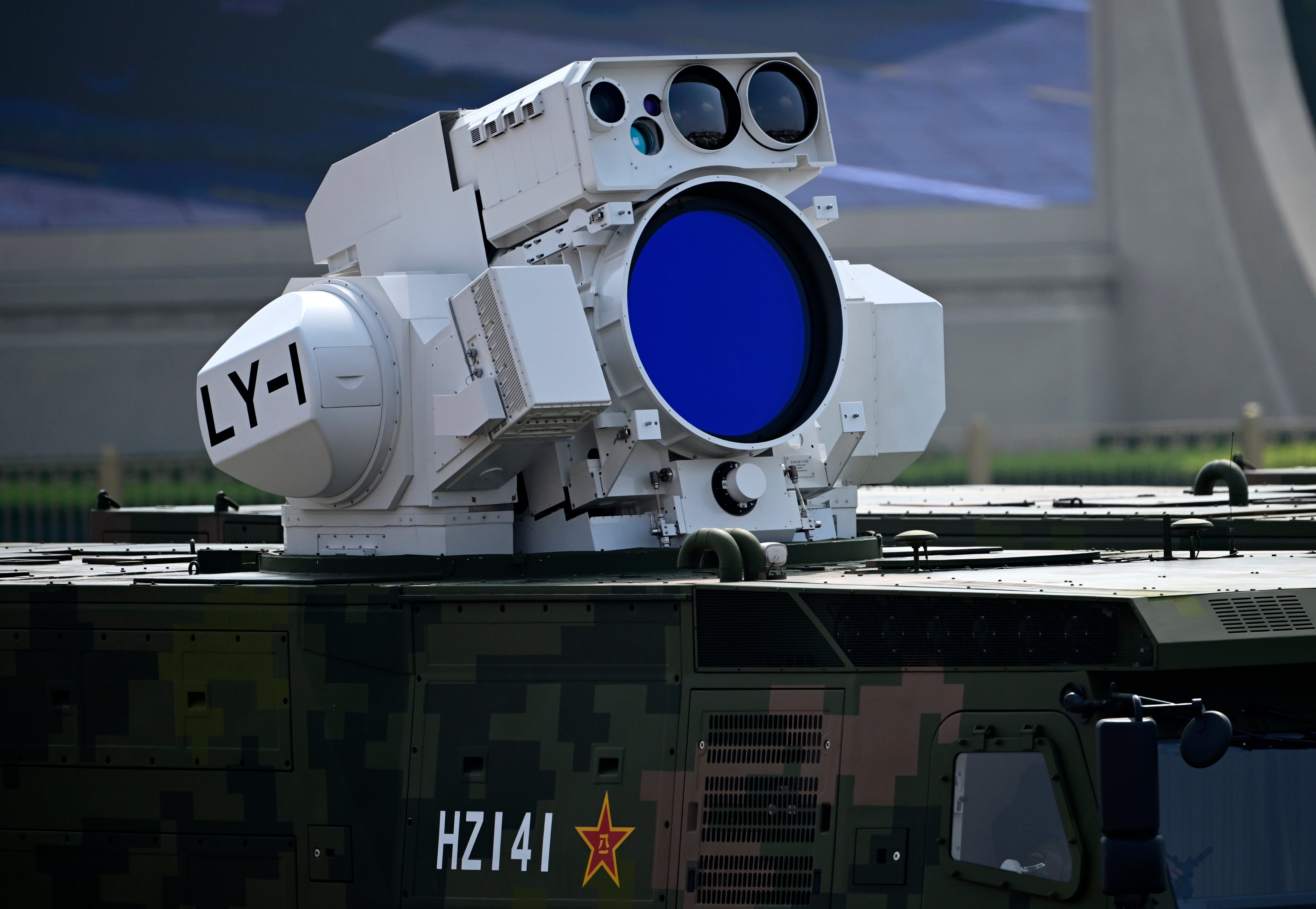 A ship-based air defence weapons formation marches through Tiananmen Square during a military parade in Beijing earlier this month. Photo: Xinhua