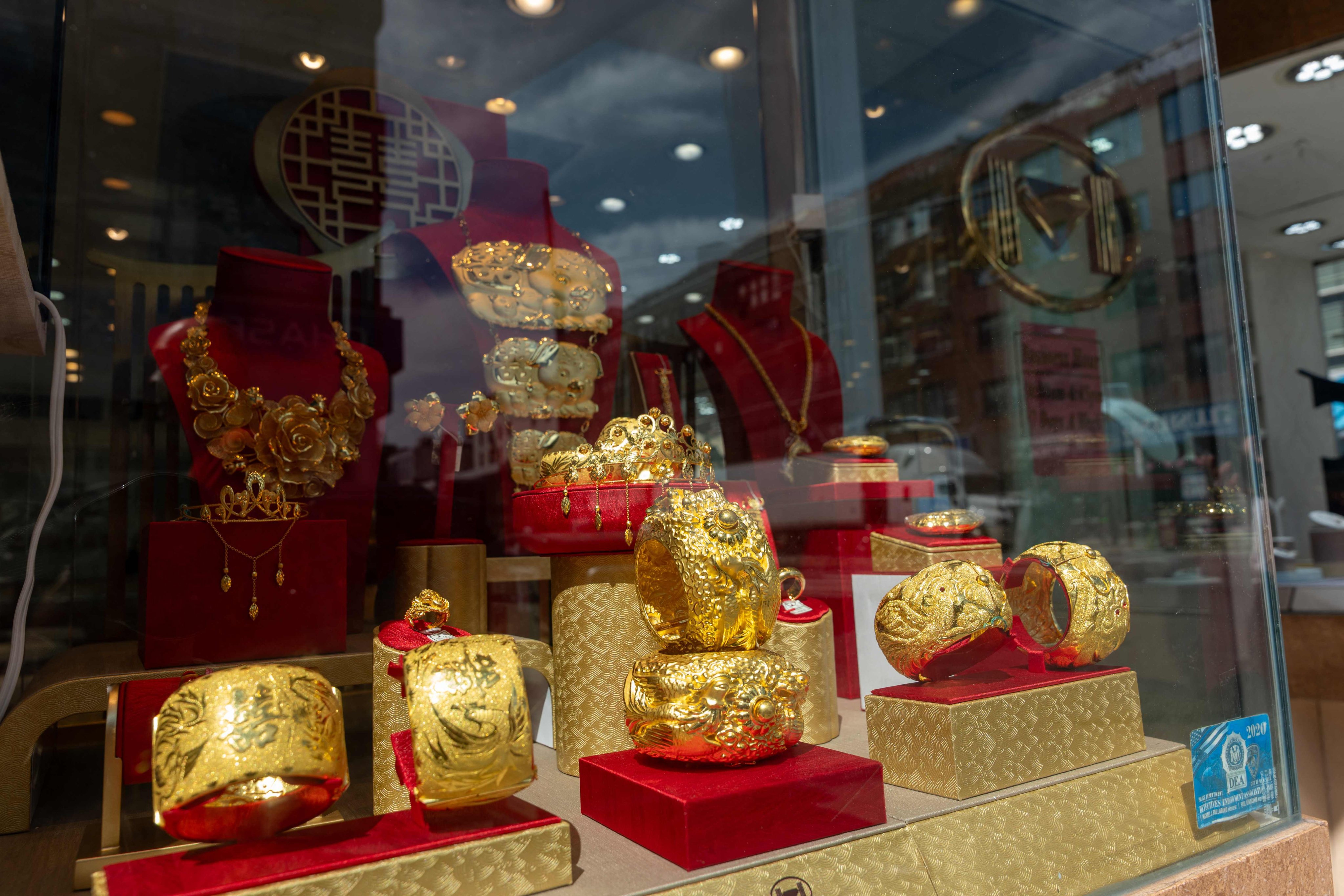 Gold jewellery is displayed in a window in New York on September 8. The price of gold is leaping to record highs nearly every day. Photo: AFP