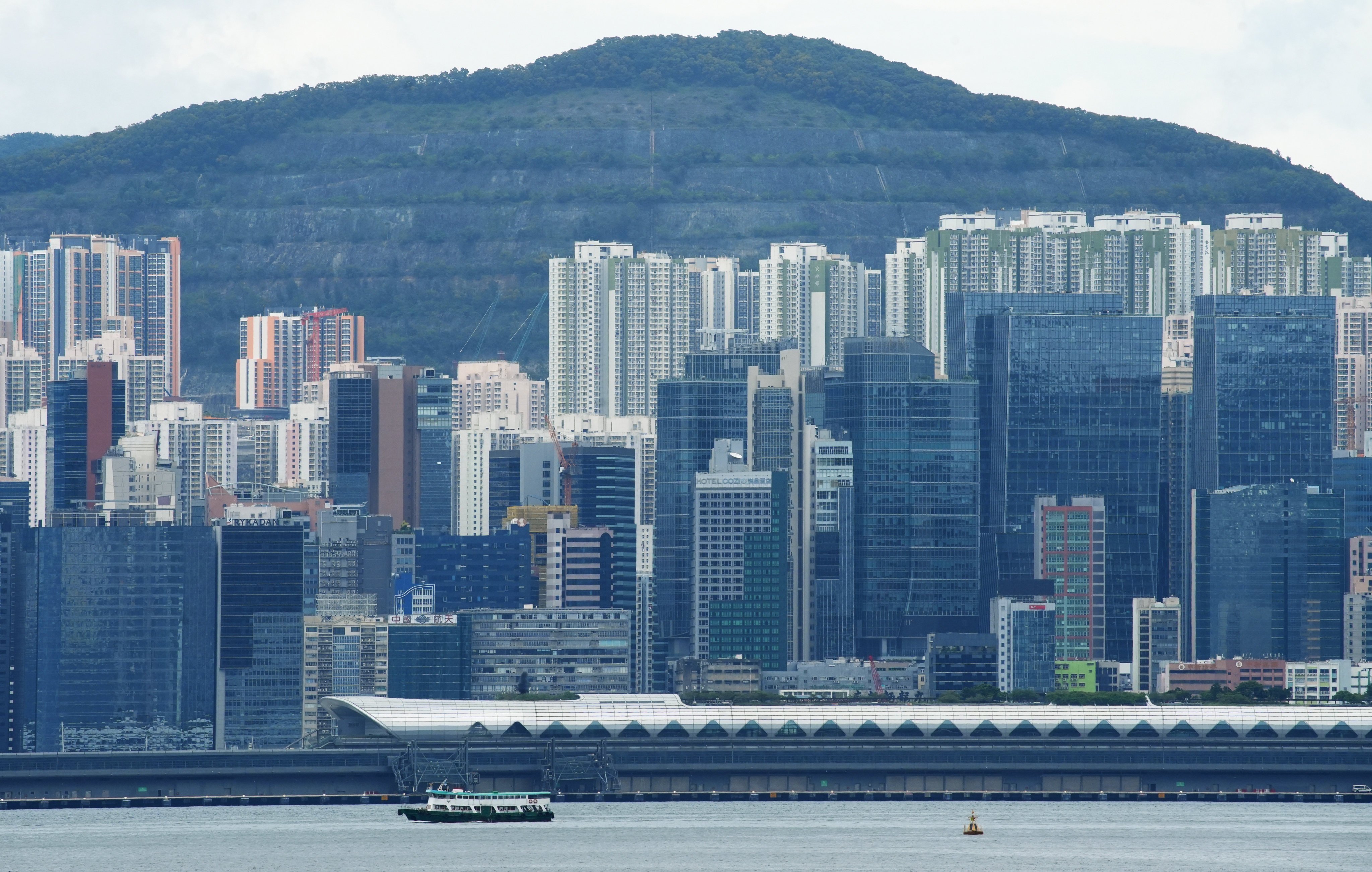 A view of Kai Tak Cruise Terminal and residential buildings in Kwun Tong, pictured from Wan Chai on May 20, 2025. Photo: Sun Yeung