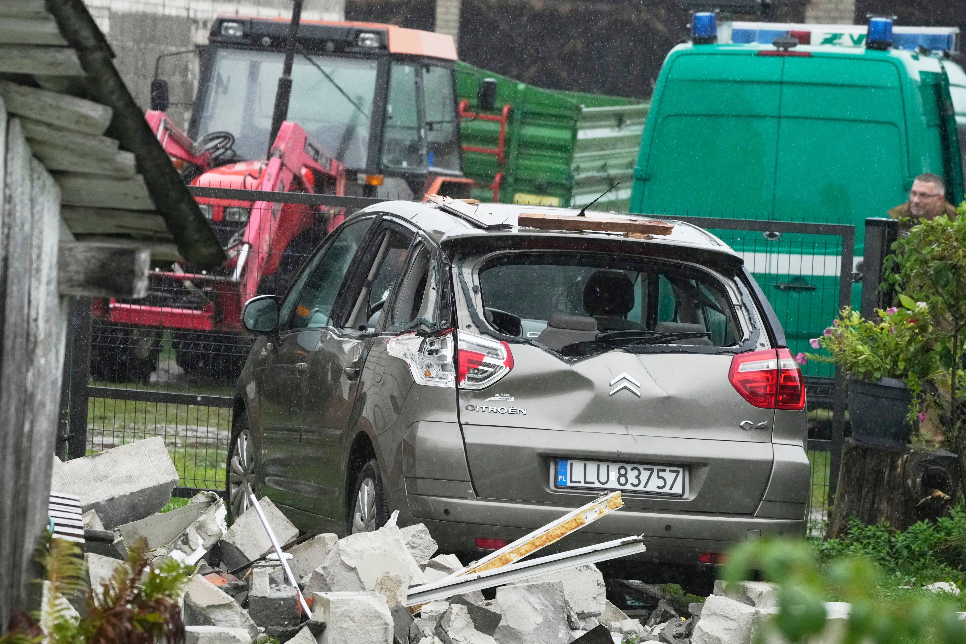 A car damaged by debris falling from a destroyed roof, after drones believed to be Russian violated Polish airspace in Wyryki near Lublin, Poland, on Thursday. Photo: AP
