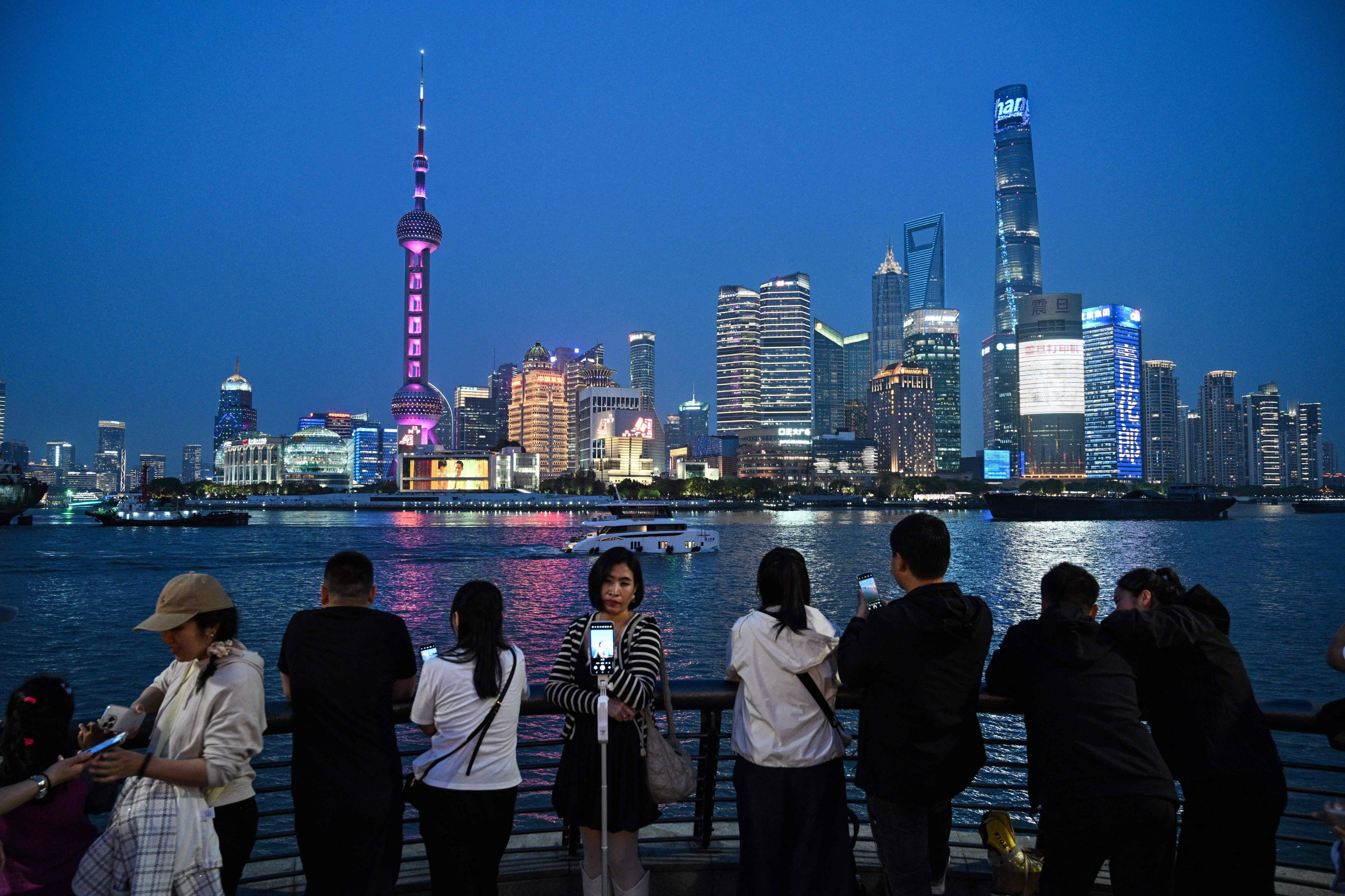 People visit The Bund in Shanghai. Photo: AFP