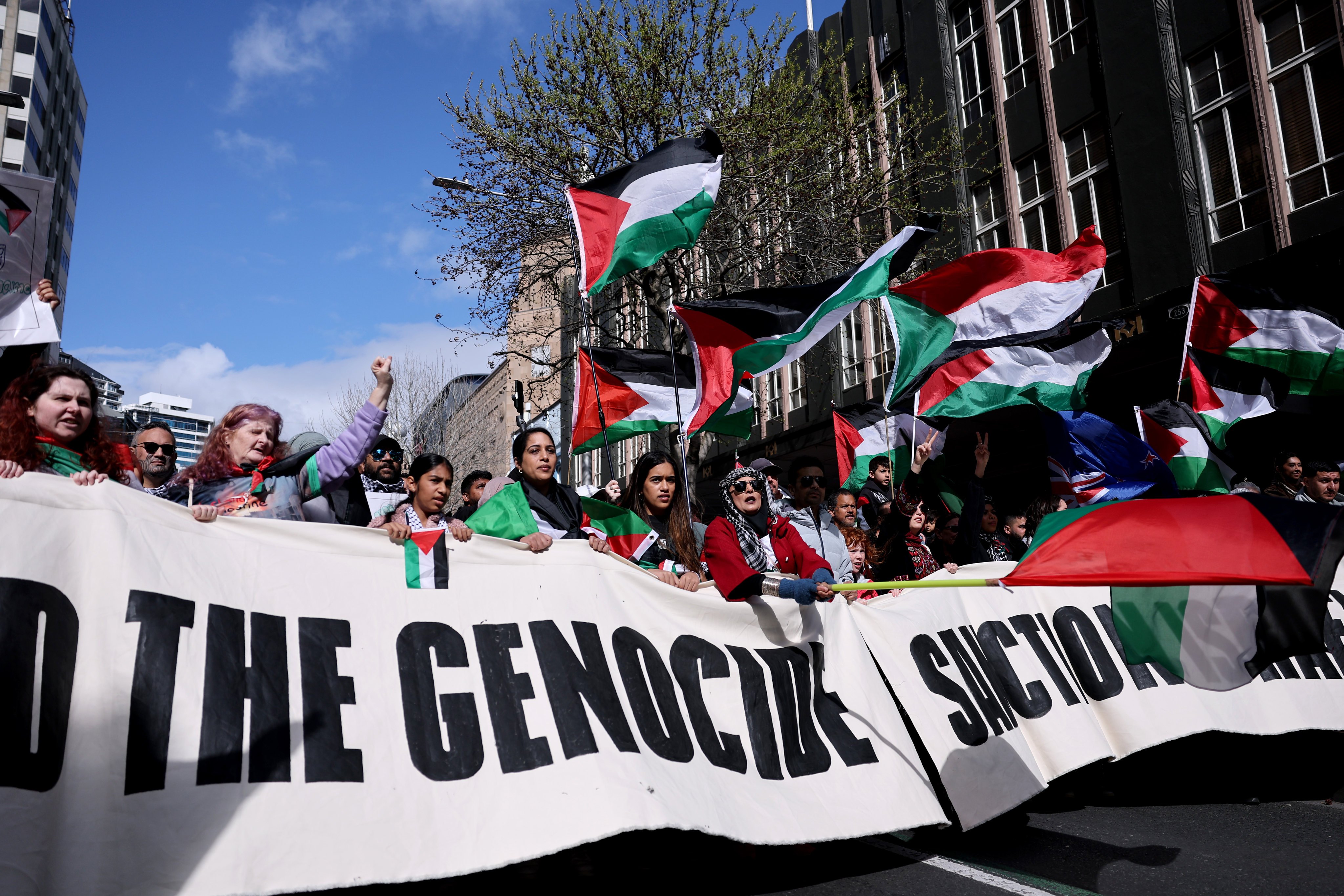 Thousands of protesters march through Auckland, New Zealand, on Saturday. Photo: Getty Images