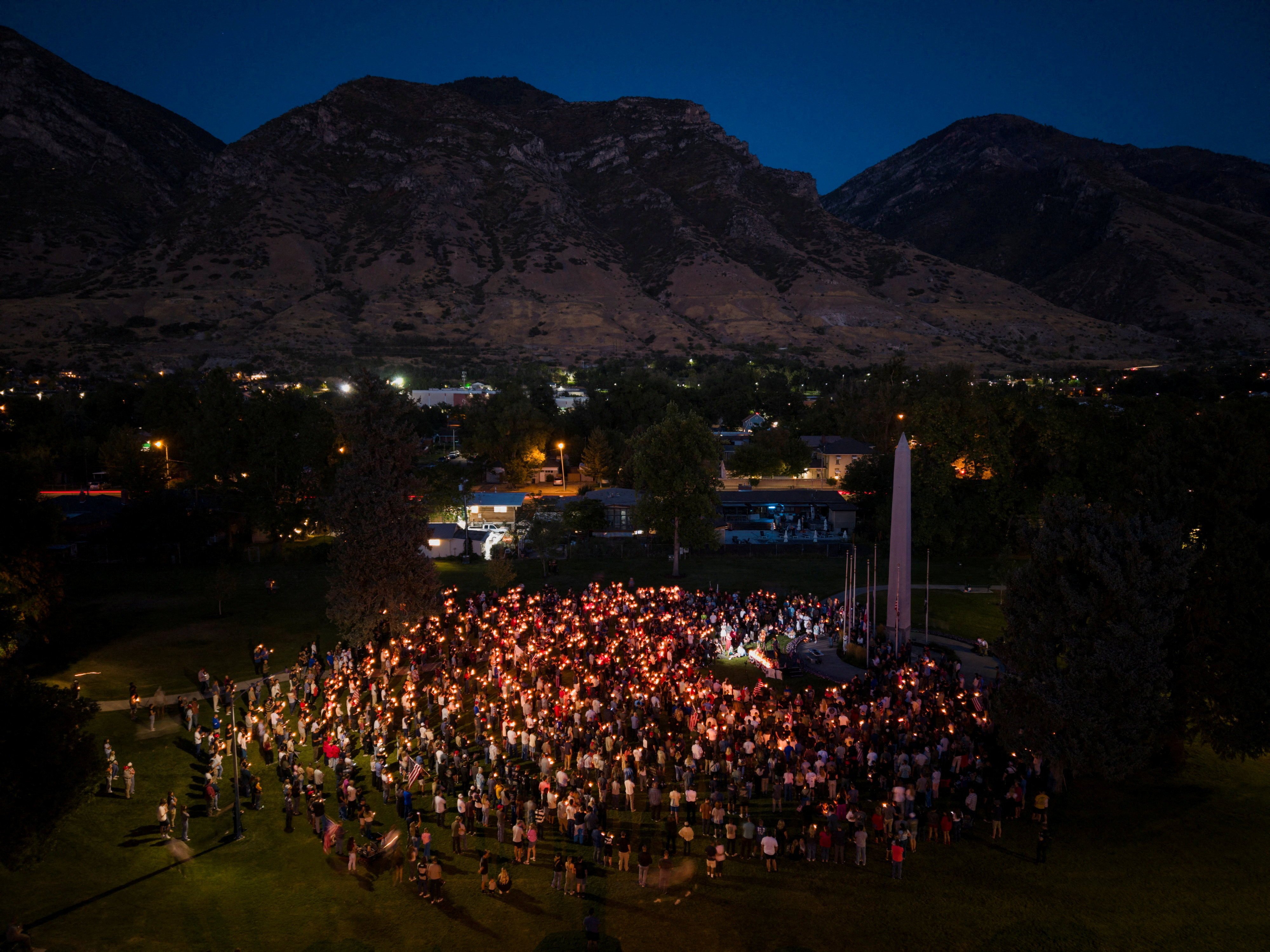 People attend a vigil for Charlie Kirk in Provo, Utah, on Saturday. Photo: Reuters