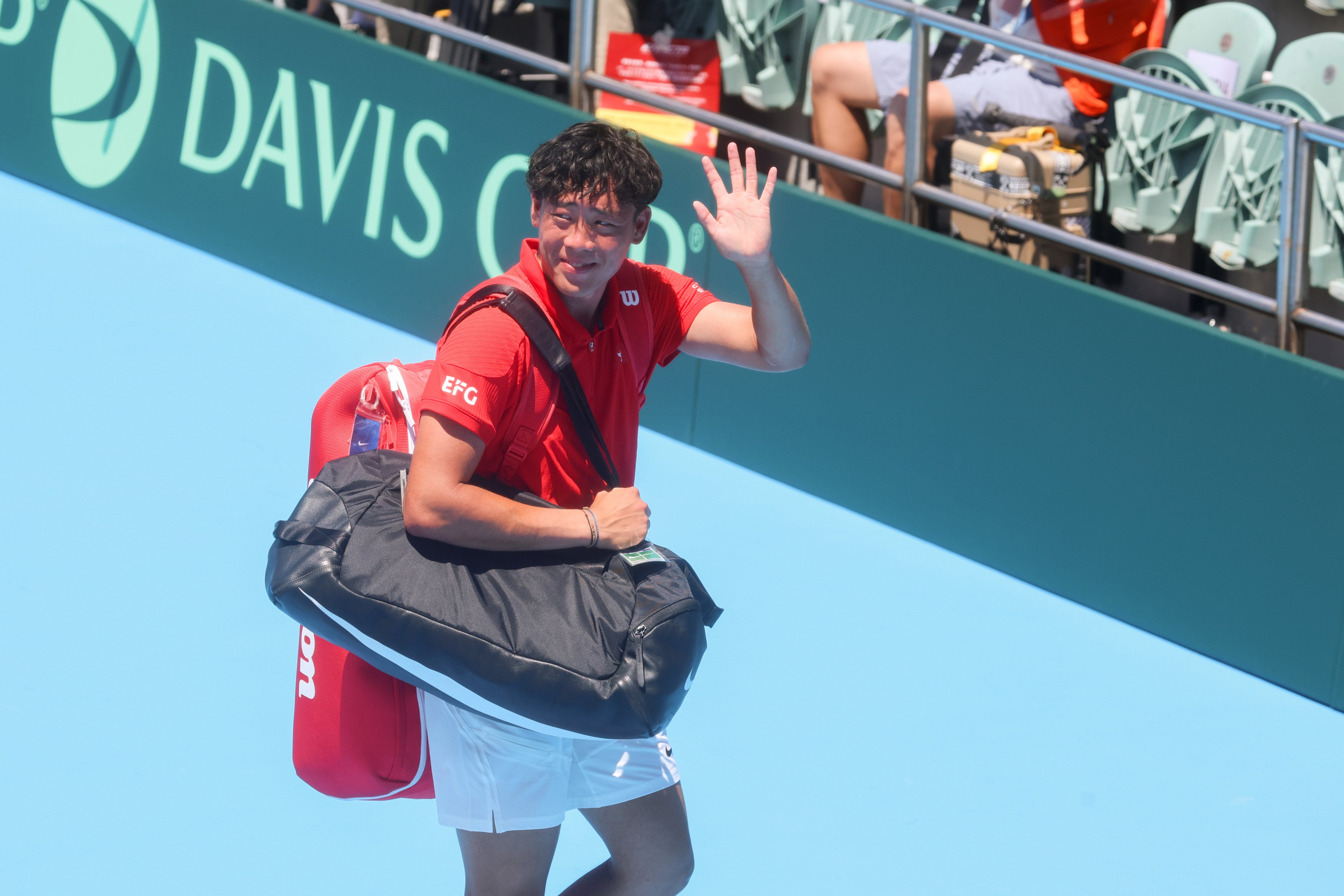 Coleman Wong waves to the crowd ahead of his match against Sergey Fomin at Victoria Park Tennis Stadium. Photo: Edmond So