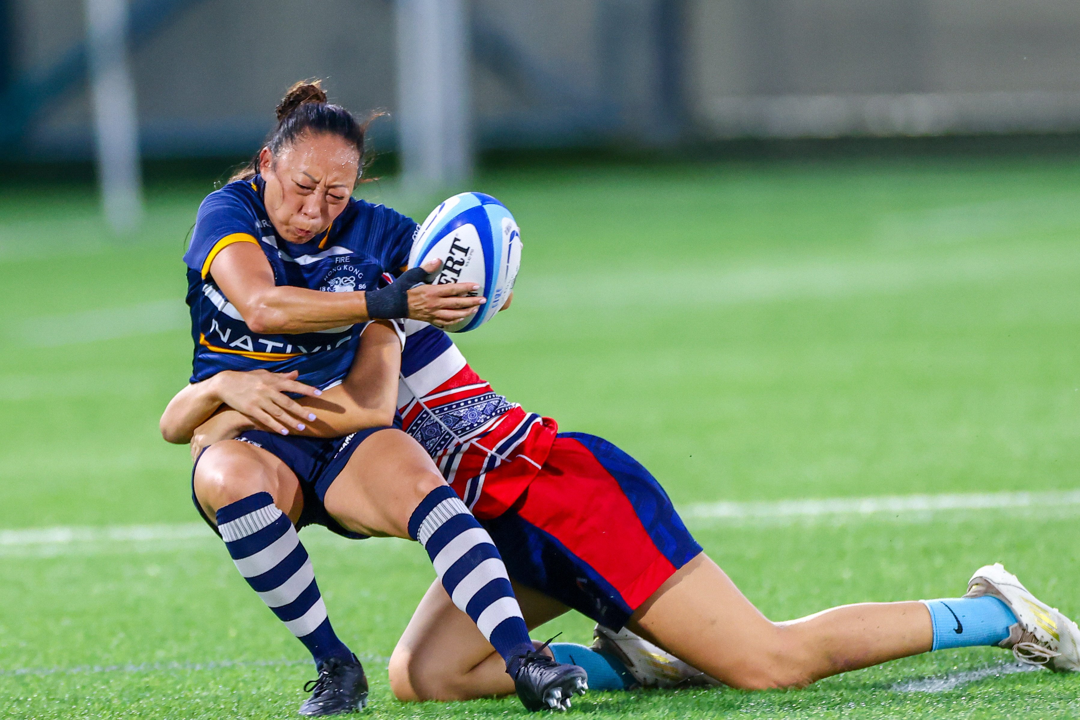 Han-Mi got to experience plenty of first playing for Football Club on Saturday, including getting tackled. Photo: Dickson Lee