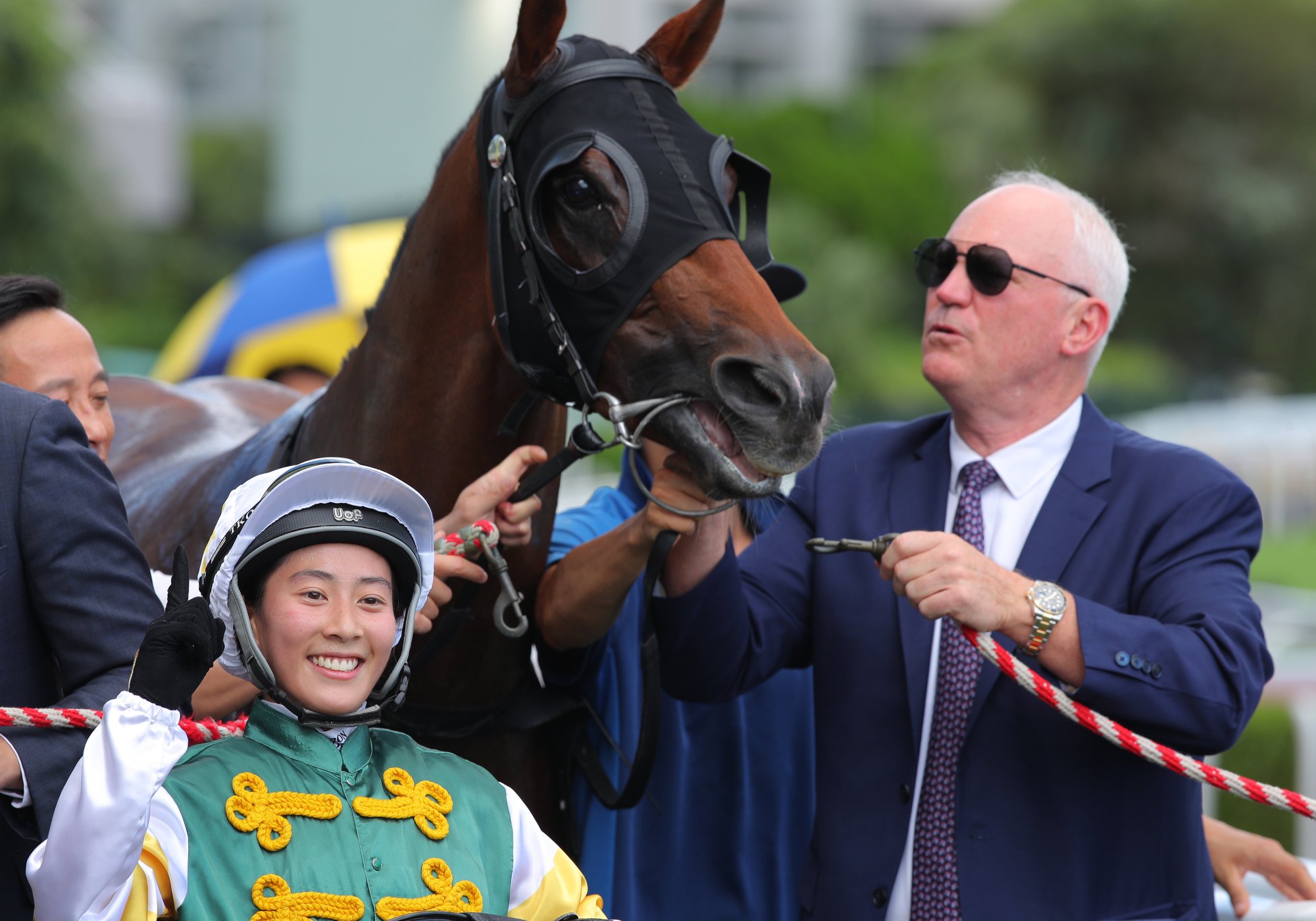 Jockey Britney Wong is all smiles after saluting aboard Fight Time for her boss David Hall.
