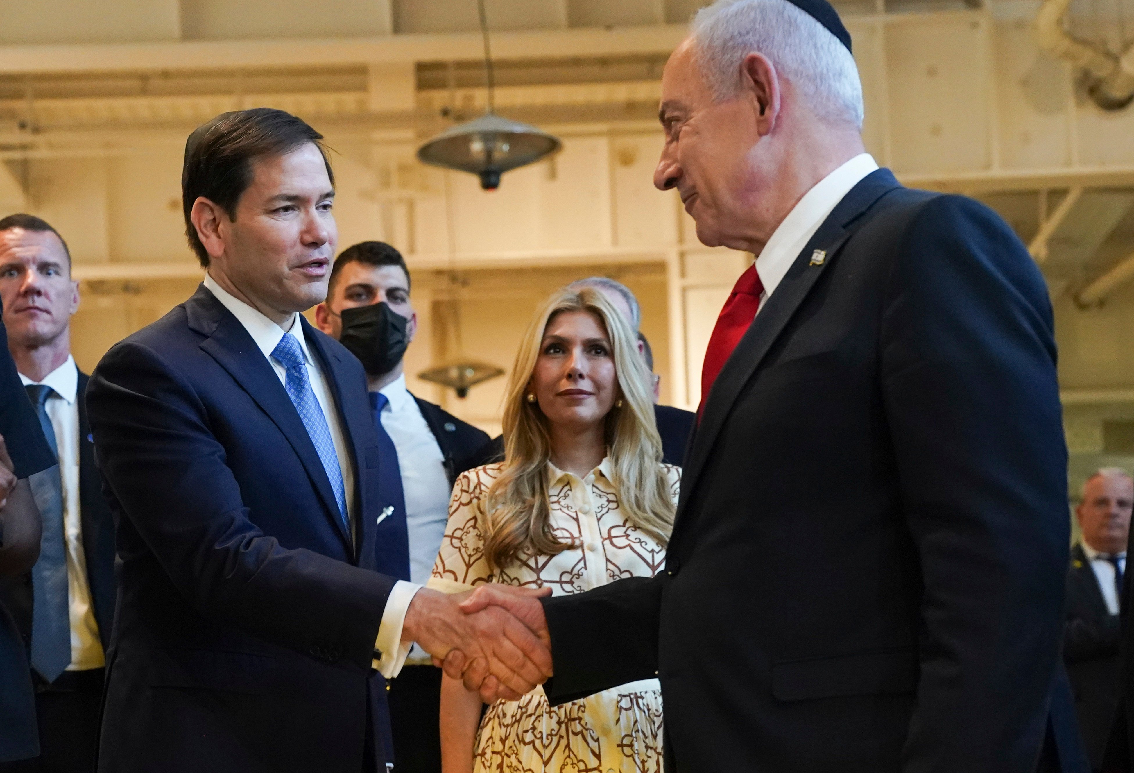 US Secretary of State Marco Rubio, left, and Israeli Prime Minister Benjamin Netanyahu shake hands as they visit the Western Wall Tunnels, in Jerusalem’s Old City, Israel on Sunday. Photo: Pool Photo via AP