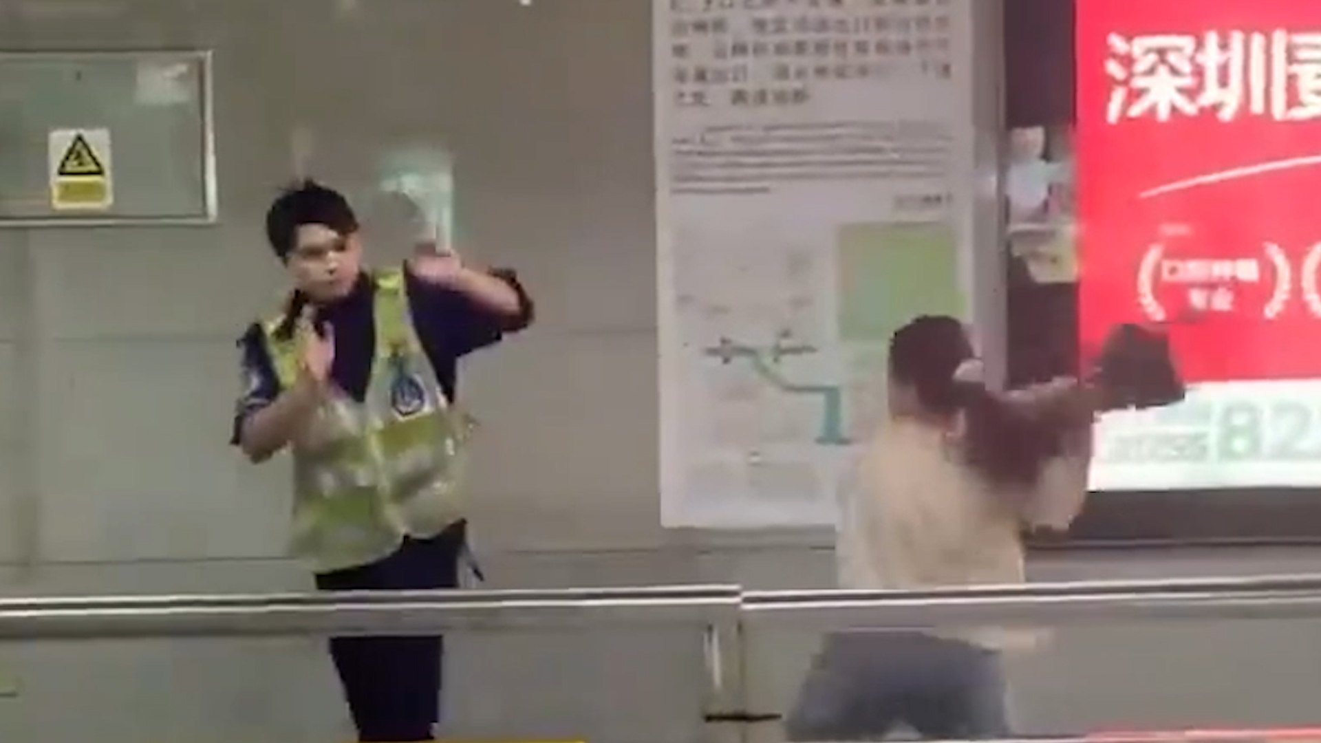 Chinese woman detained for assaulting security guard at Shenzhen metro. Photo: Newsflare