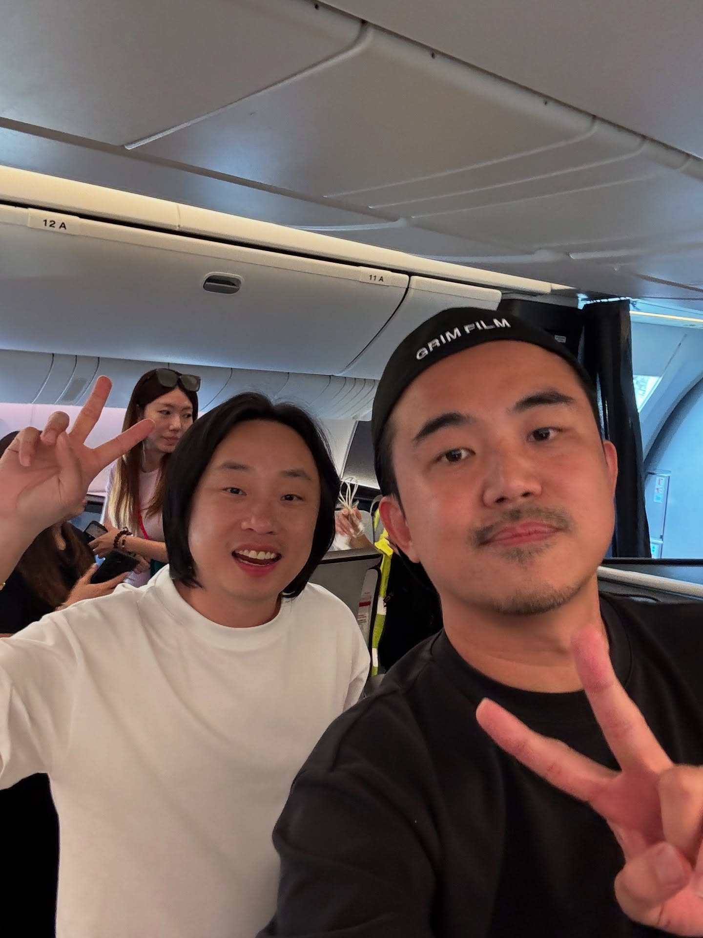 Malaysian film director Jared Lee (right) with Jimmy O. Yang during filming of adverts for Cathay Pacific. Lee reveals how his testicular cancer battle reshaped his filmmaking journey. Photo:  Instagram/jaredle3