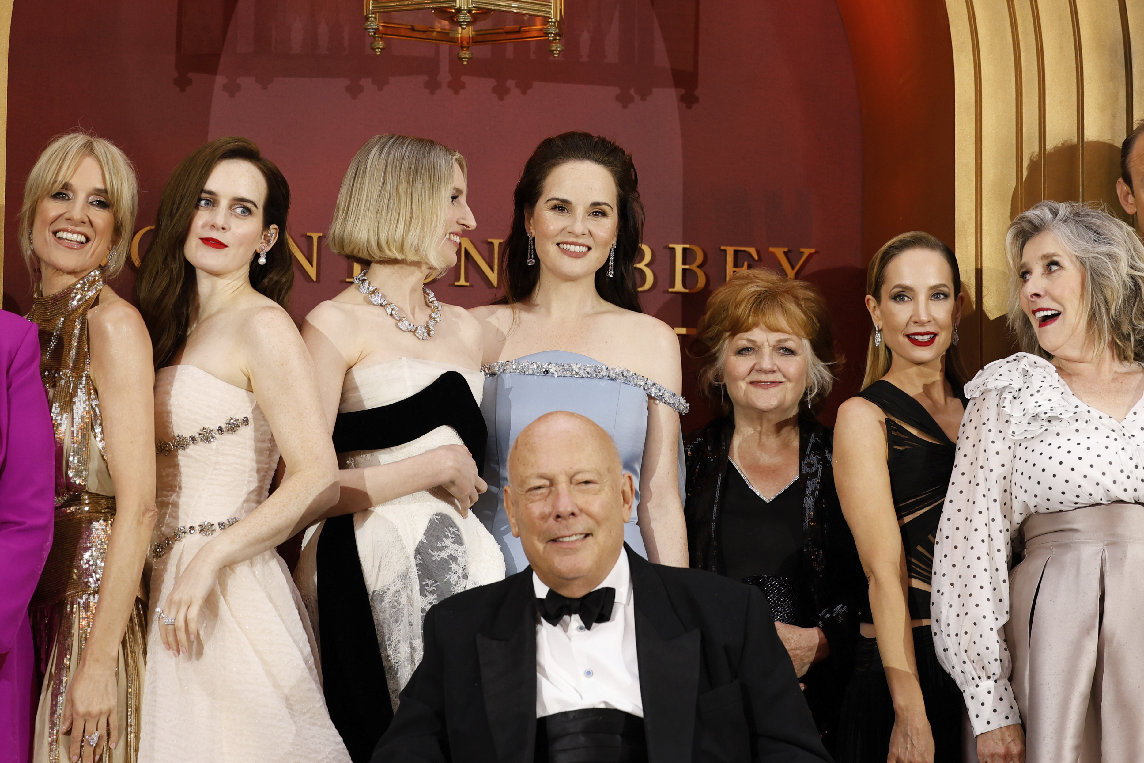 The cast of Downton Abbey: The Grand Finale and writer Julian Fellowes (front) at the world premiere of the film in London. Photo: AP