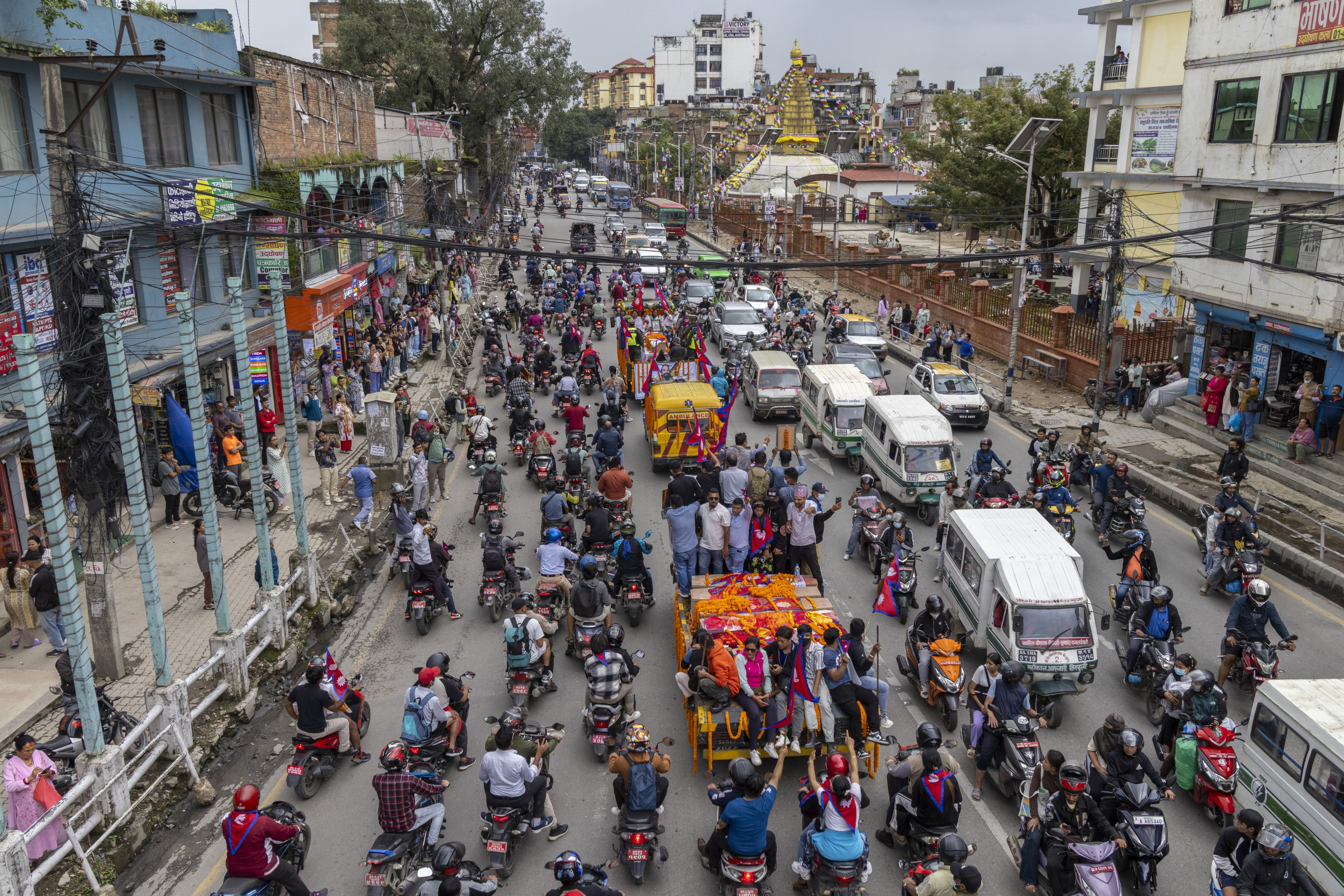People take part in a tribute rally for the people who died during the Gen Z protest in Kathmandu on Tuesday. Photo: EPA
