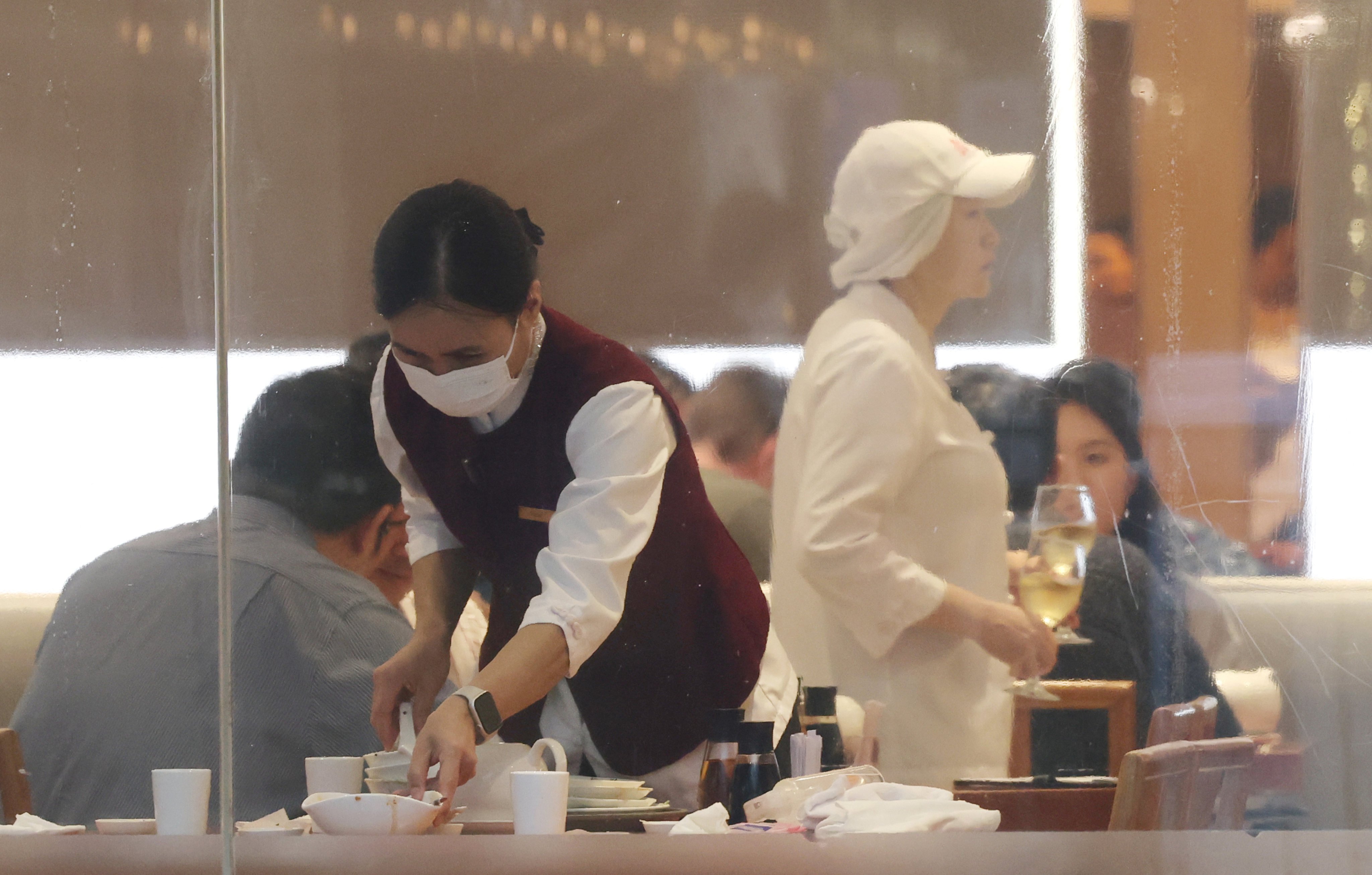 The new measures will tighten restrictions on employers importing waiters and junior cooks under the Enhanced Supplementary Labour Scheme. Photo: Jelly Tse