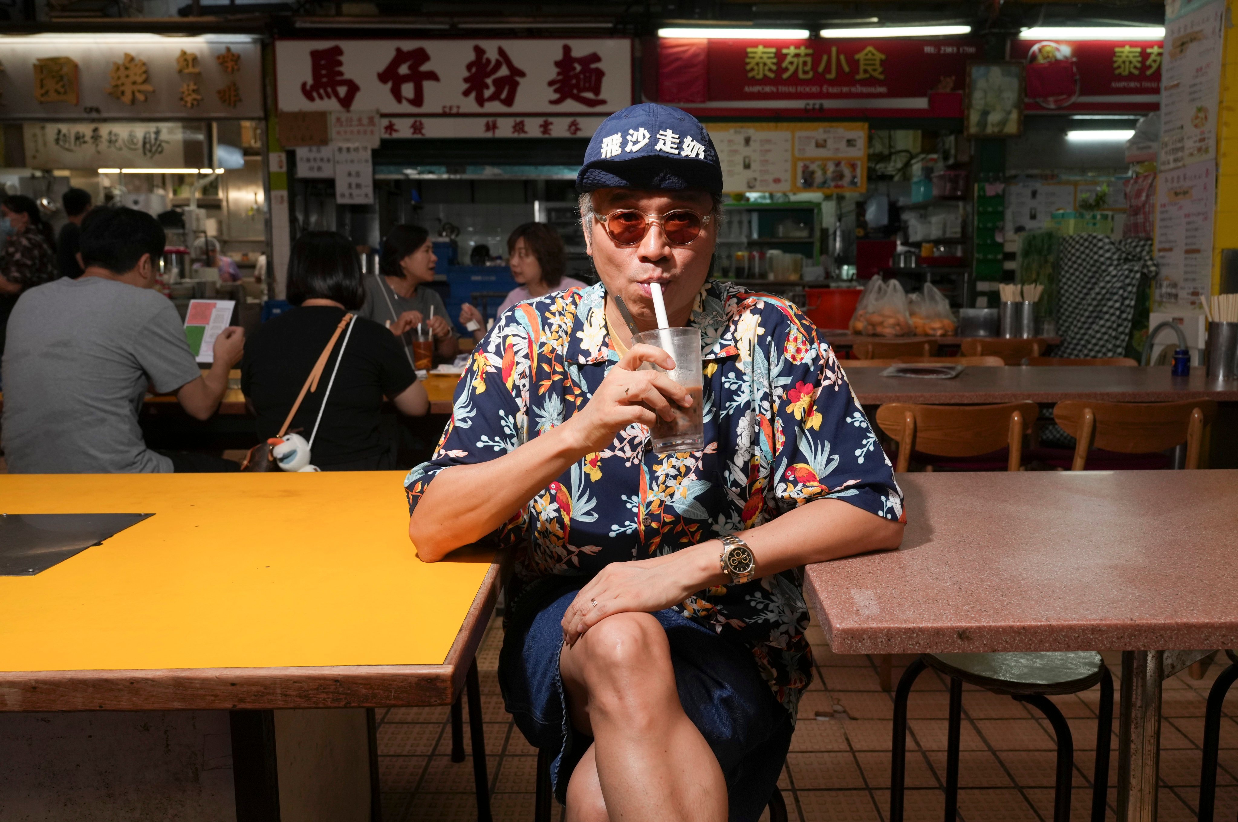 Kent Wong, aka Uncle K, at Lok Yuen, a traditional Hong Kong-style cha chaan teng cafe in Kowloon City. The content creator has risen to Instagram fame in recent months with his videos about Hong Kong restaurants. Photo: Sam Tsang