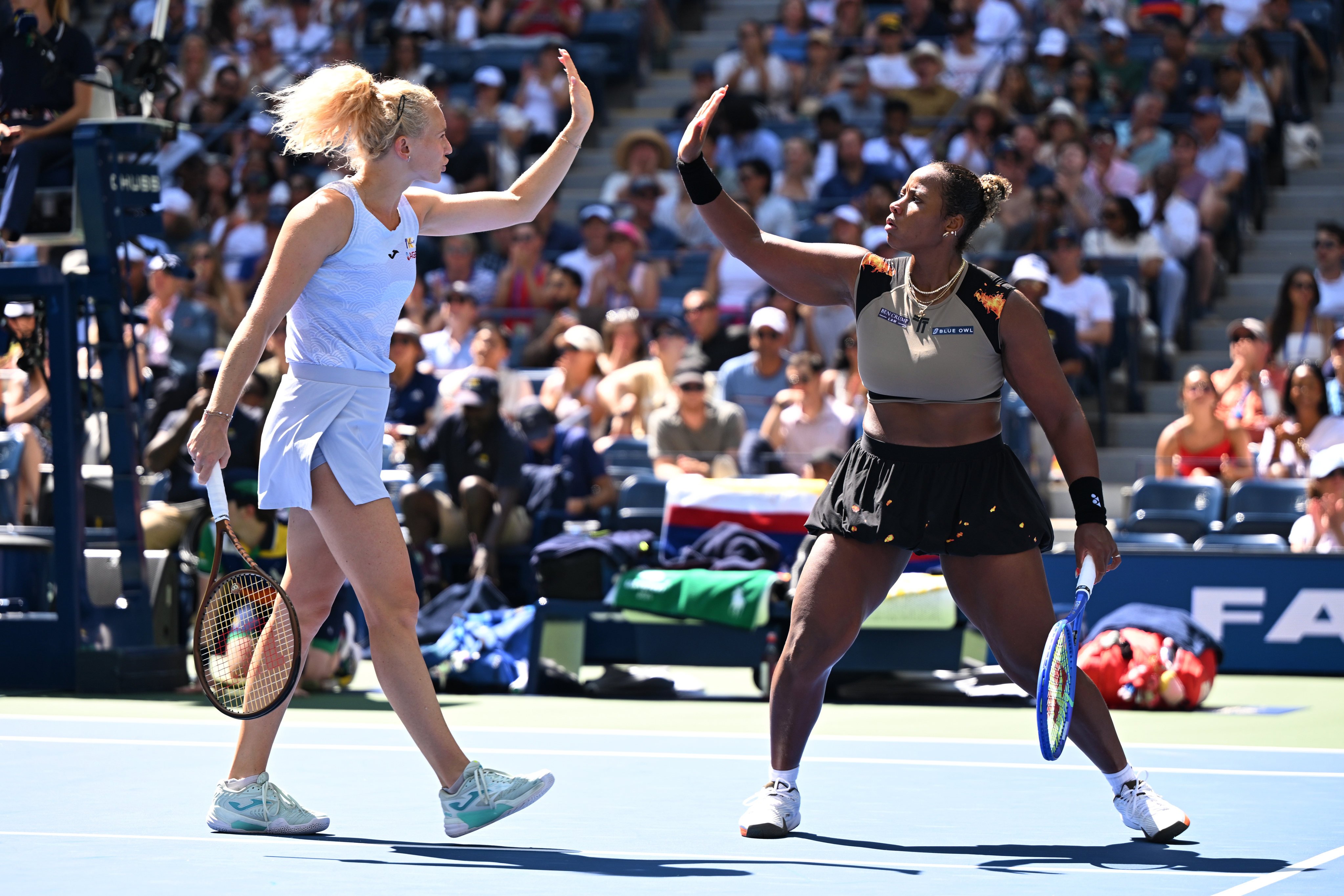 Katerina Siniakova (left) and Taylor Townsend celebrate scoring during the women’s US Open doubles final against Gabriela Dabrowski and Erin Routliffe. Photo: Xinhua