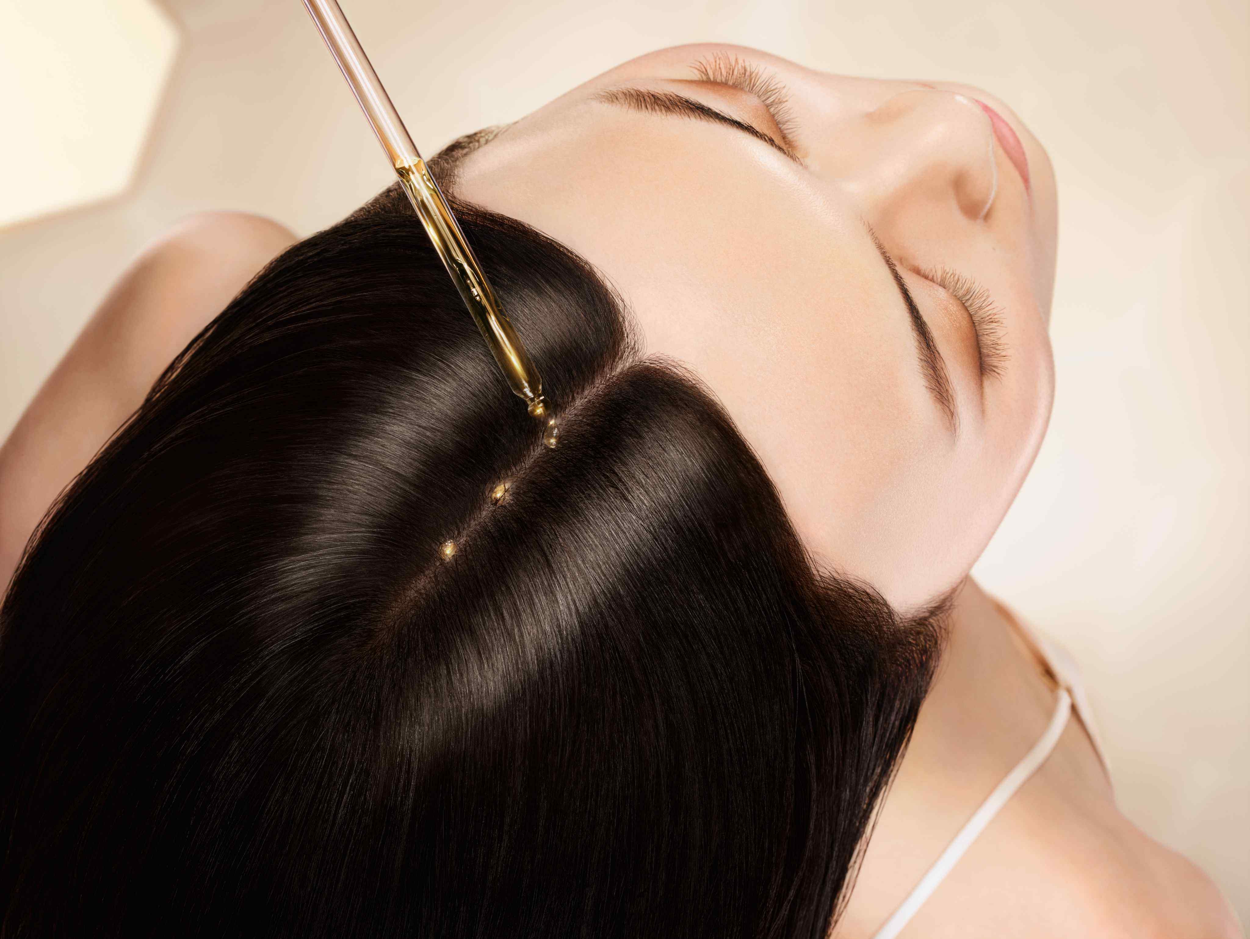 Slow down and apply products such as Guerlain’s Abeille Royale Scalp and Hair Youth-Oil-in Serum – your hair will thank you later. Photo: Handout