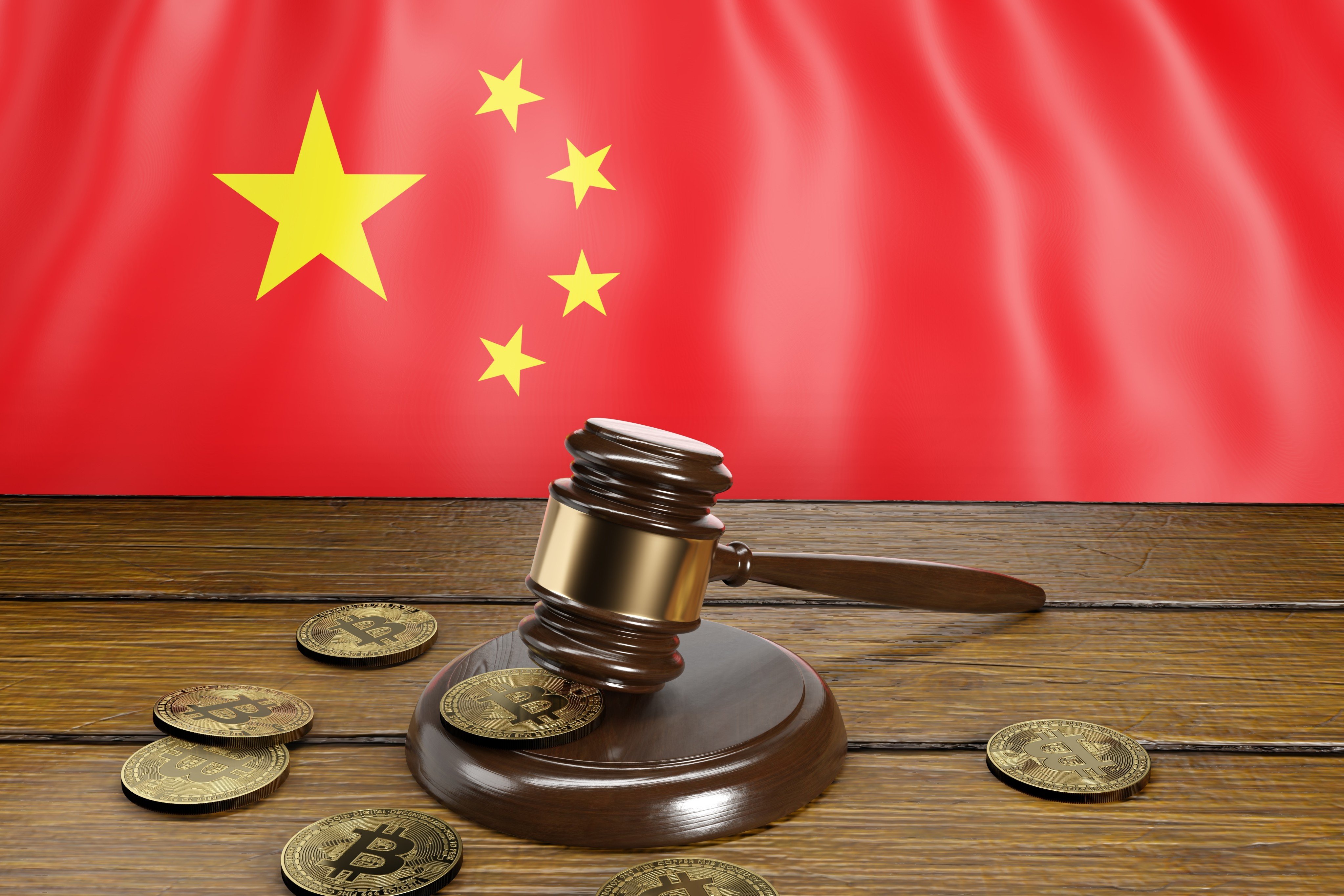 [Shutterstock] Stock Illustration ID: 2195814993
Court gavel and golden bitcoins on the flag of China. 3D Illustration of the concept of blocking foreign crypto exchanges lacking permit. Shutterstock Images