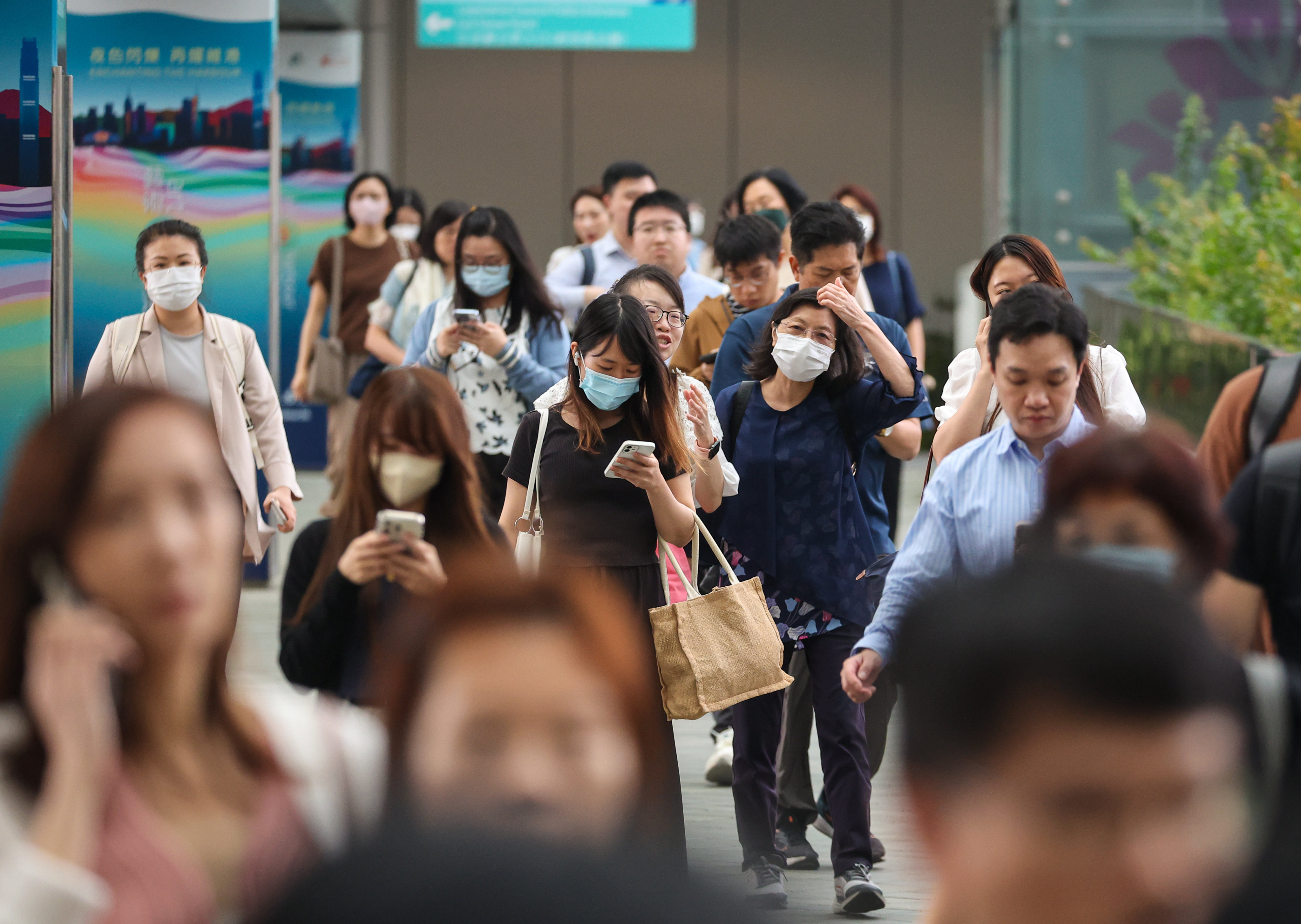 Civil servants leave the government’s headquarters in Admiralty. Photo: Edmond So