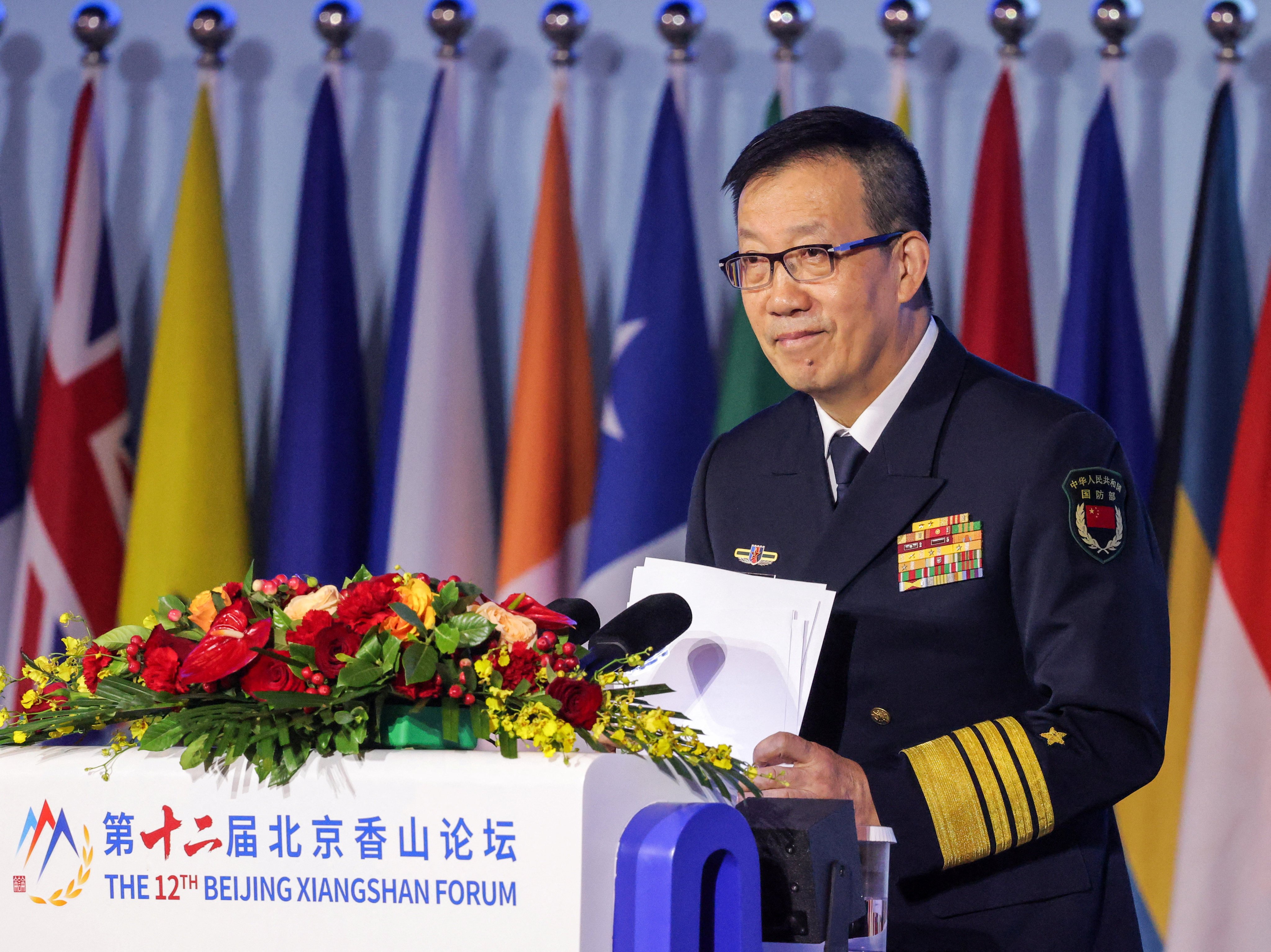 Chinese Defence Minister Dong Jun addresses the Beijing Xiangshan Forum on Thursday. Photo: Reuters