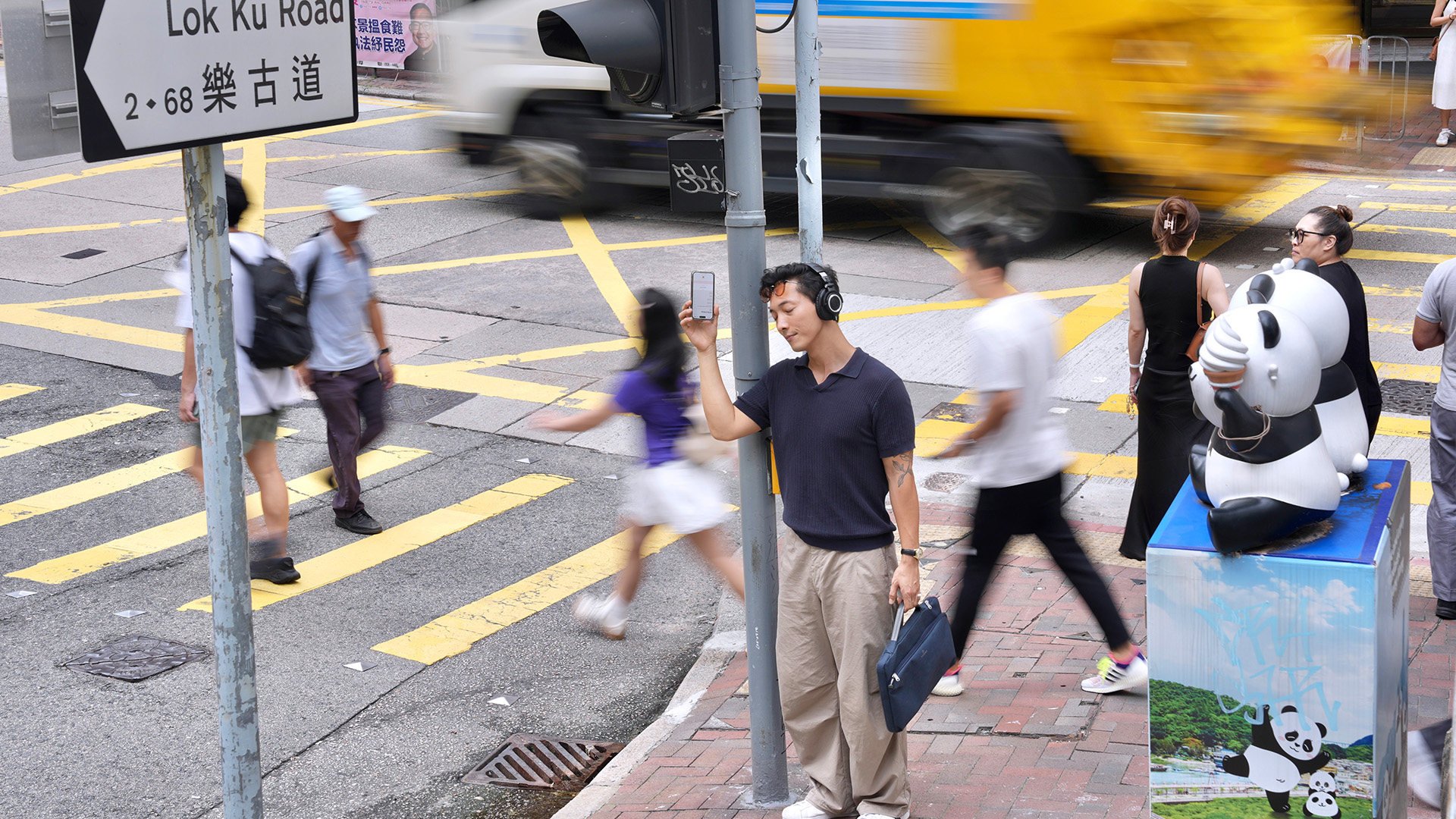 Laurie Lau Kwok-hong, a musician who records everyday sounds from places such as MTR stations and shopping malls to create his compositions, poses for a photo during an interview in Sheung Wan.