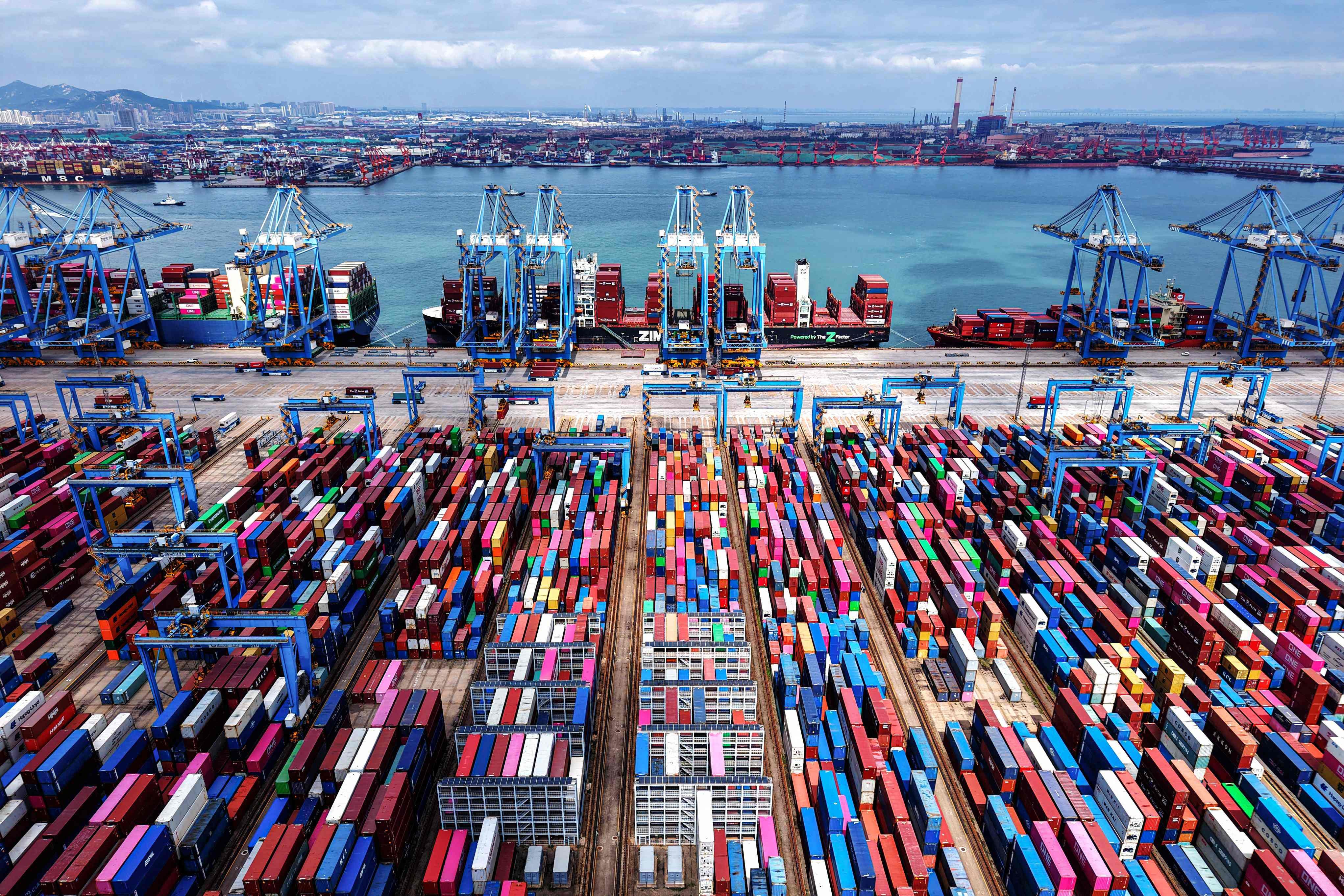 Shipping containers are stacked at a port in Qingdao, in eastern China’s Shandong province on September 4. China’s exports to the United States have fallen amid the trade war, but there has been a wide divergence in terms of the trade war’s impact on different Chinese regions. Photo: AFP