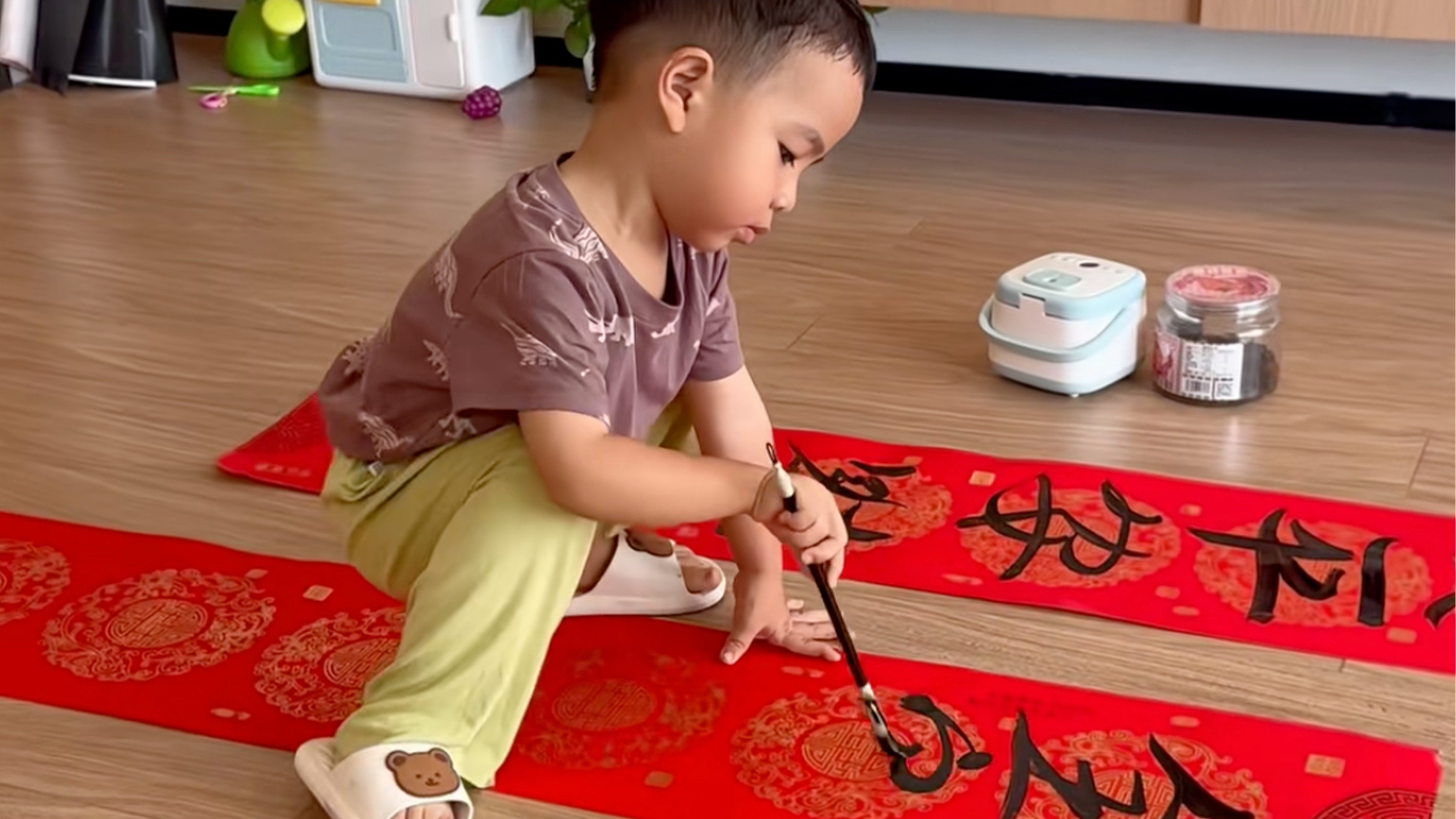 A three-year-old boy in China has gone viral for his impressive calligraphy skills. Photo: Douyin