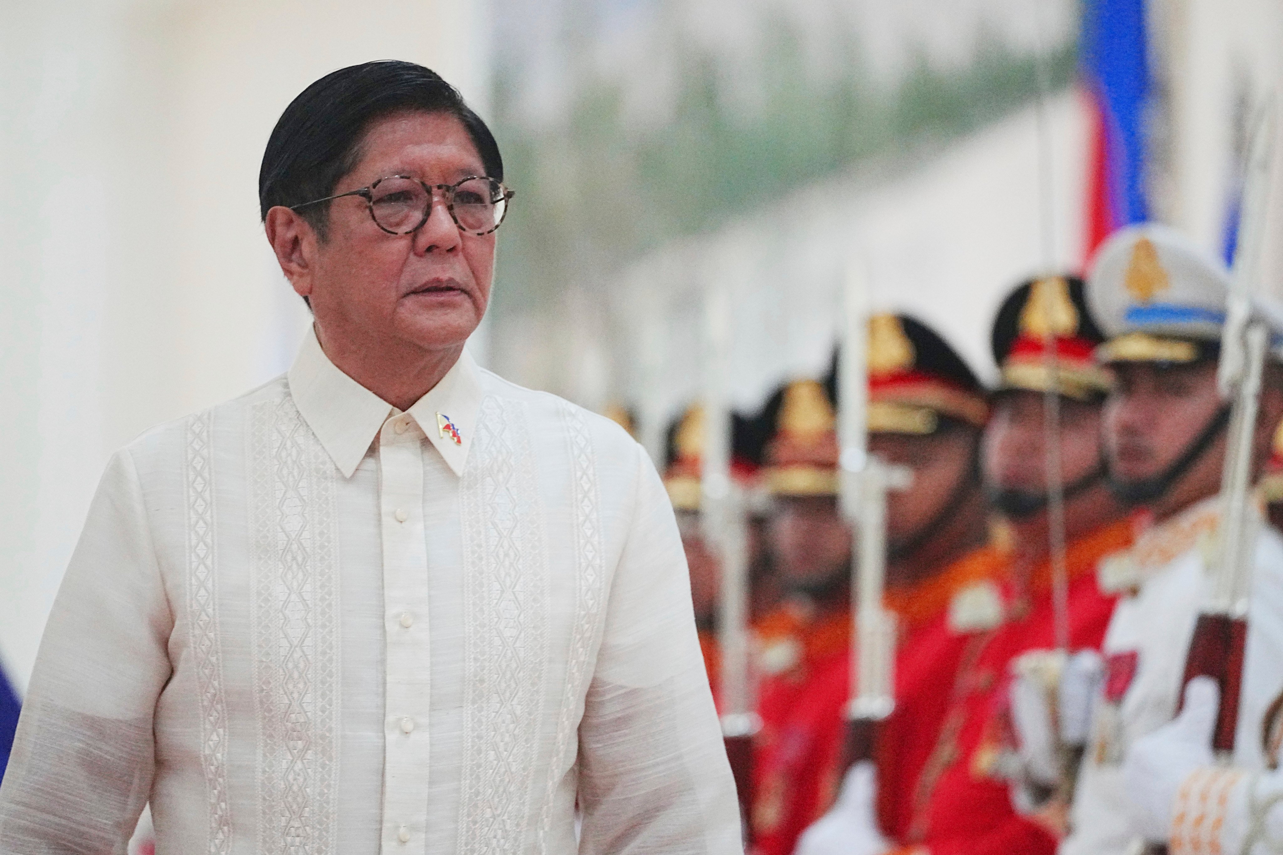 Philippine President Ferdinand Marcos Jnr reviews an honour guard during a state visit to Cambodia on September 8. Photo: AP