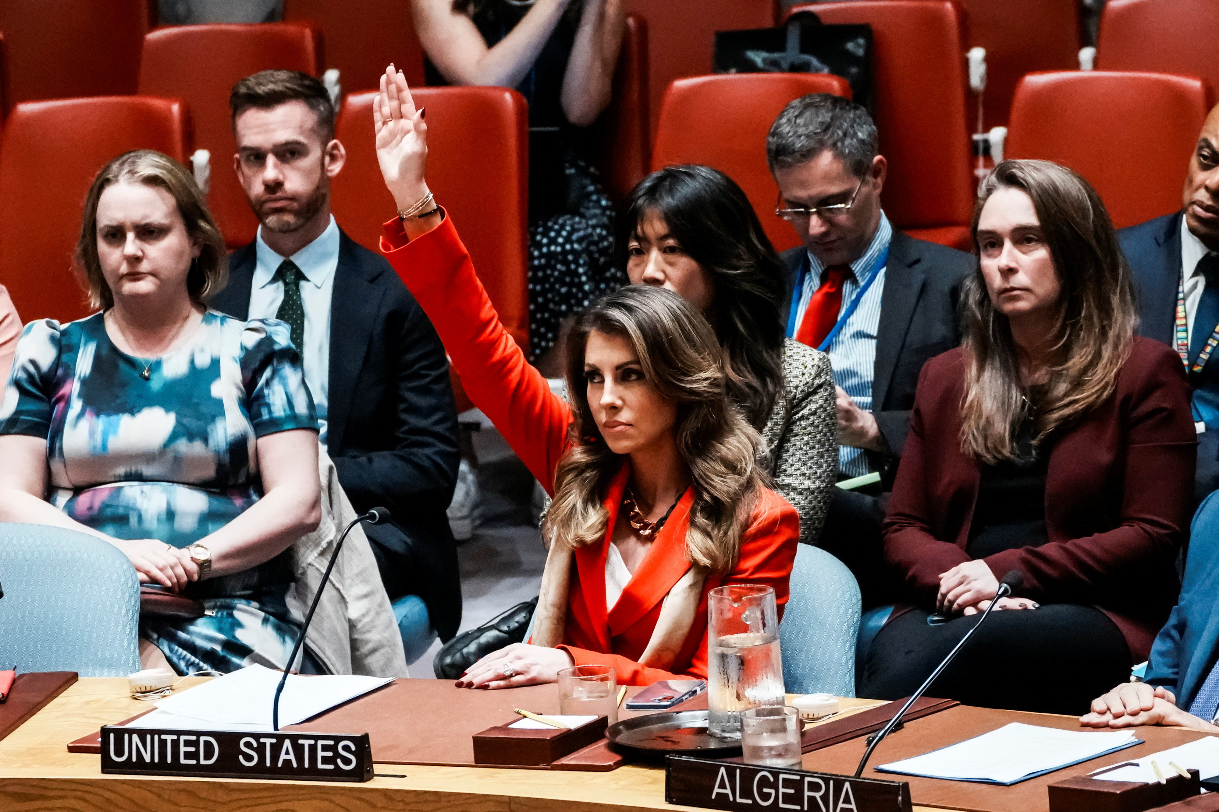 Deputy United States Special Envoy to the Middle East Morgan Ortagus raises her hand to cast a veto on a draft resolution demanding a ceasefire in Gaza at UN headquarters in New York on Thursday. Photo: Reuters