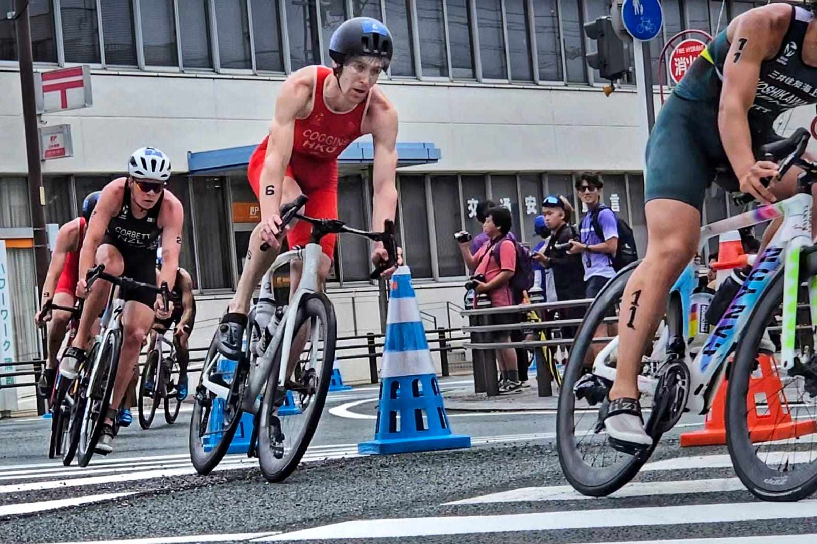 Oscar Coggins navigates a tricky bike course on his way to finishing sixth in the Asia Triathlon Cup. Photo: TAHKC