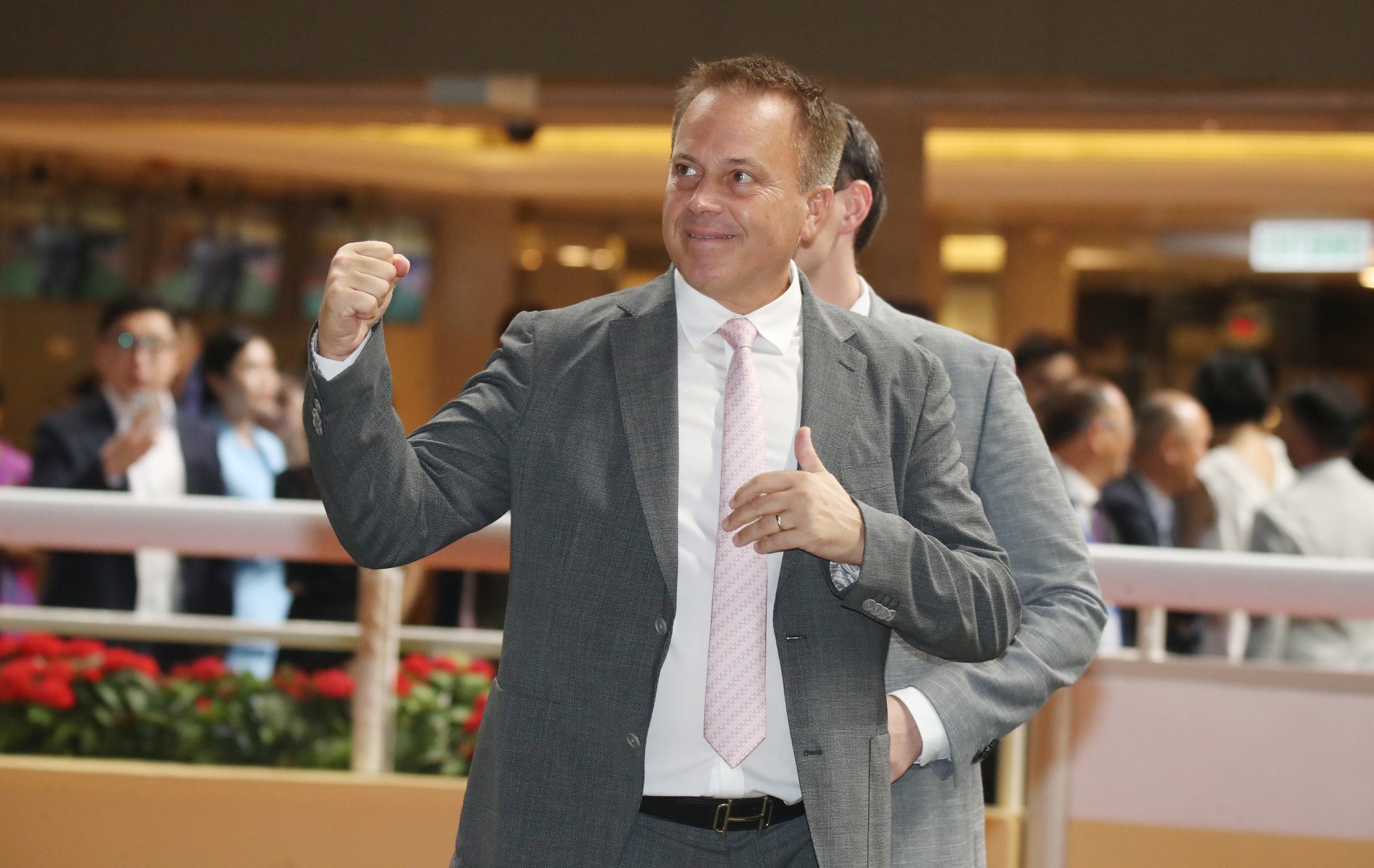 Caspar Fownes celebrates his Happy Valley four-timer on Wednesday night.