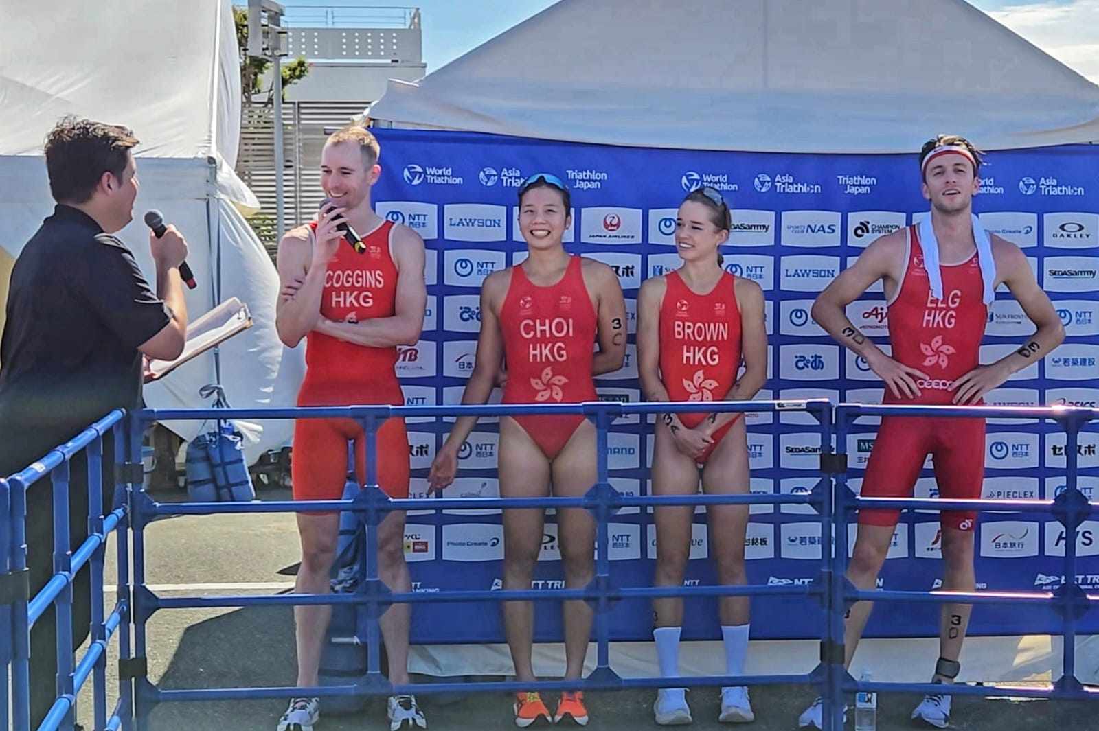 (From left) Oscar Coggins, Hilda Choi, Bailee Brown and Robin Elg speak after the race. Photo: TAHKC