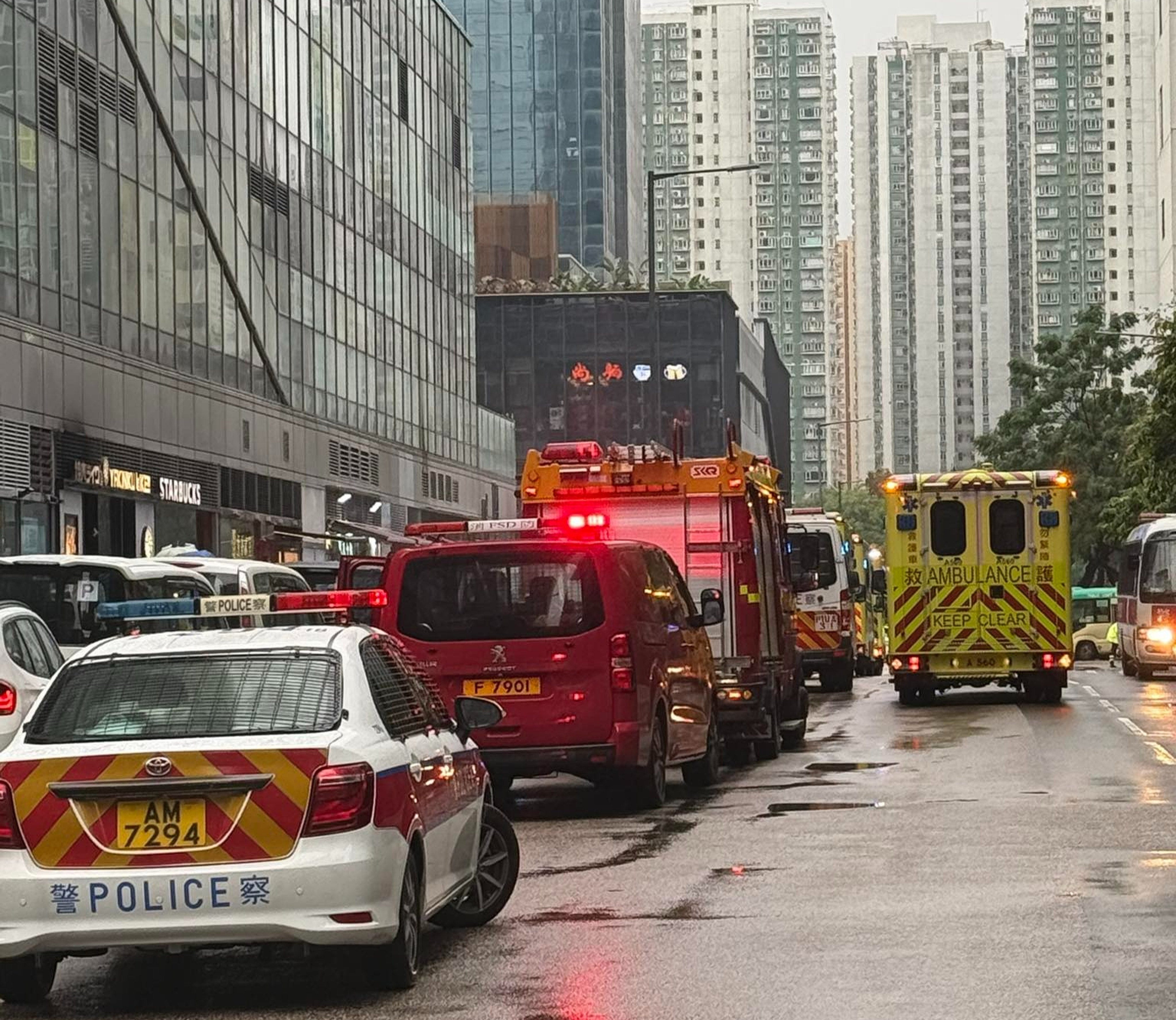 Emergency service vehicles are seen outside Kings Wing Plaza 2 in Shek Mun, Sha Tin. Photo: Handout