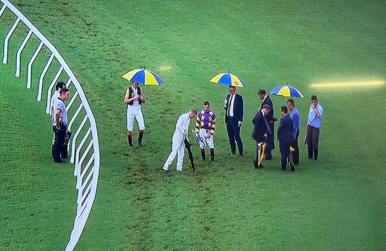 Jockeys and officials inspect the Sha Tin track on Sunday. Photos: Kenneth Chan