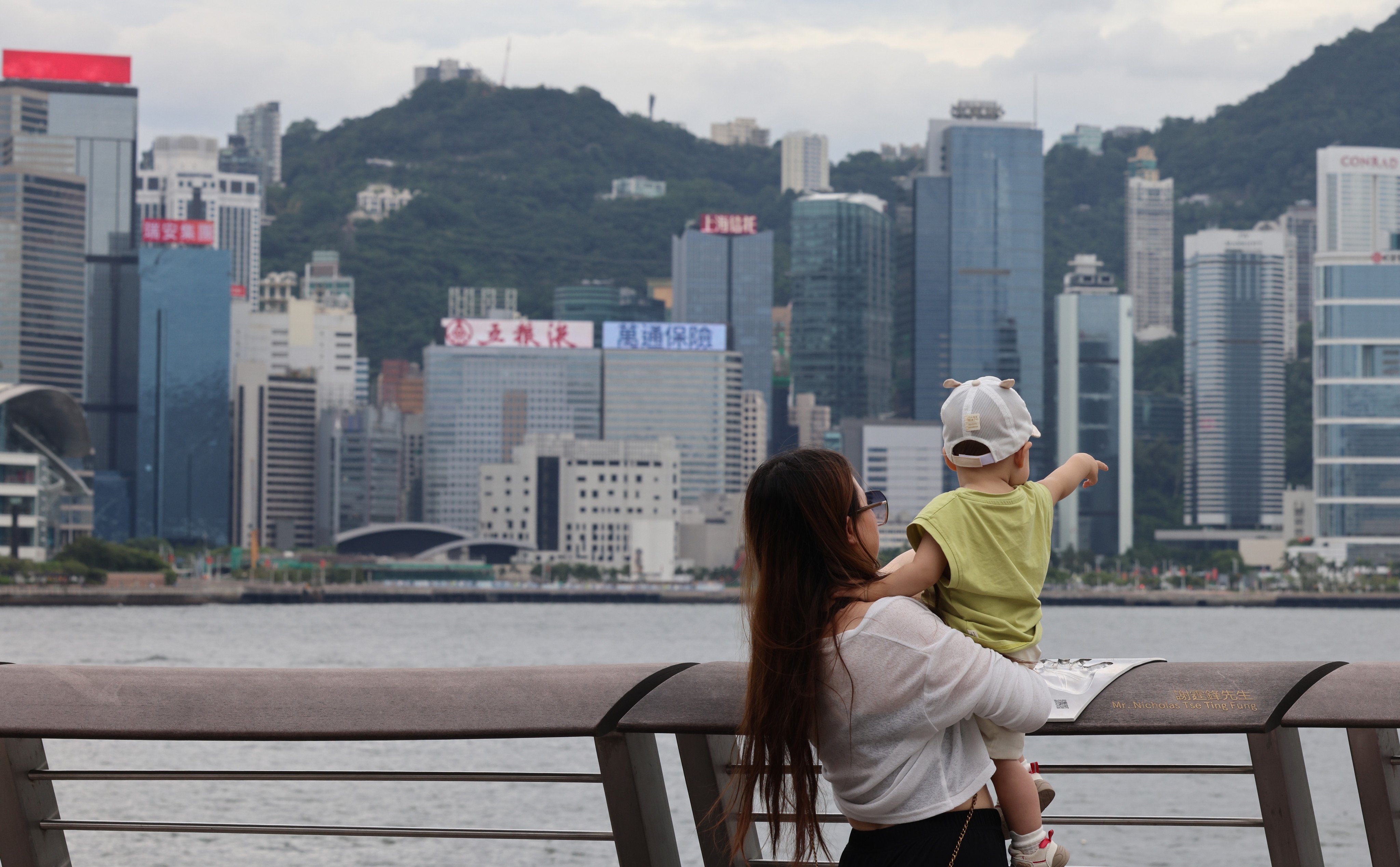 A woman and a  baby at the Tsim Sha Tsui waterfront on September 19. Photo: Jelly Tse