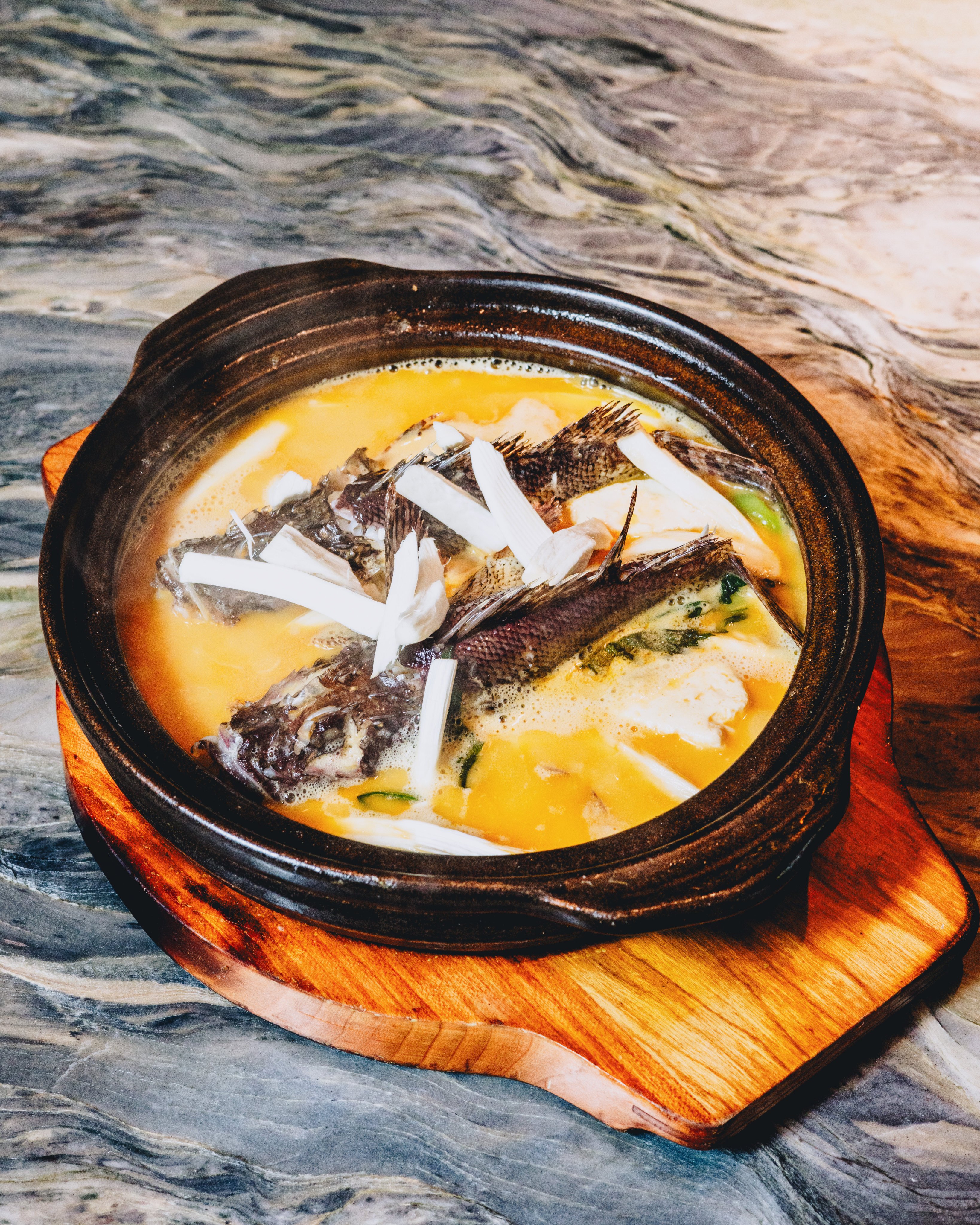Braised stone fish with termite mushroom in yellow sauce at Furong, a Hunan restaurant in Sheung Wan, Hong Kong. Photo: Handout