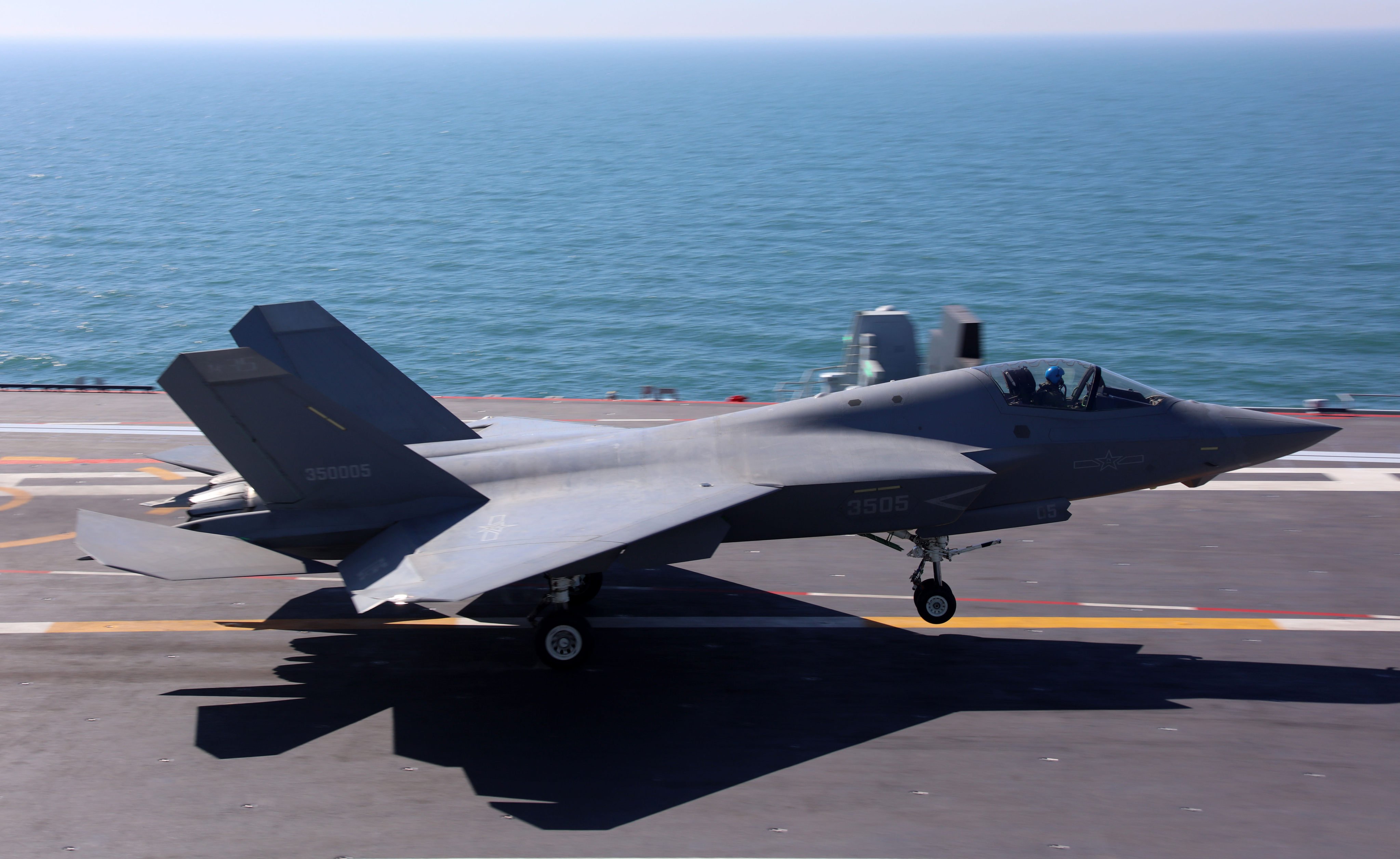 The carrier-based J-15T, J-35 (pictured) and KJ-600 aircraft have completed their inaugural electromagnetic catapult-assisted take-off and landing tests on the Fujian aircraft carrier. Photo: Xinhua