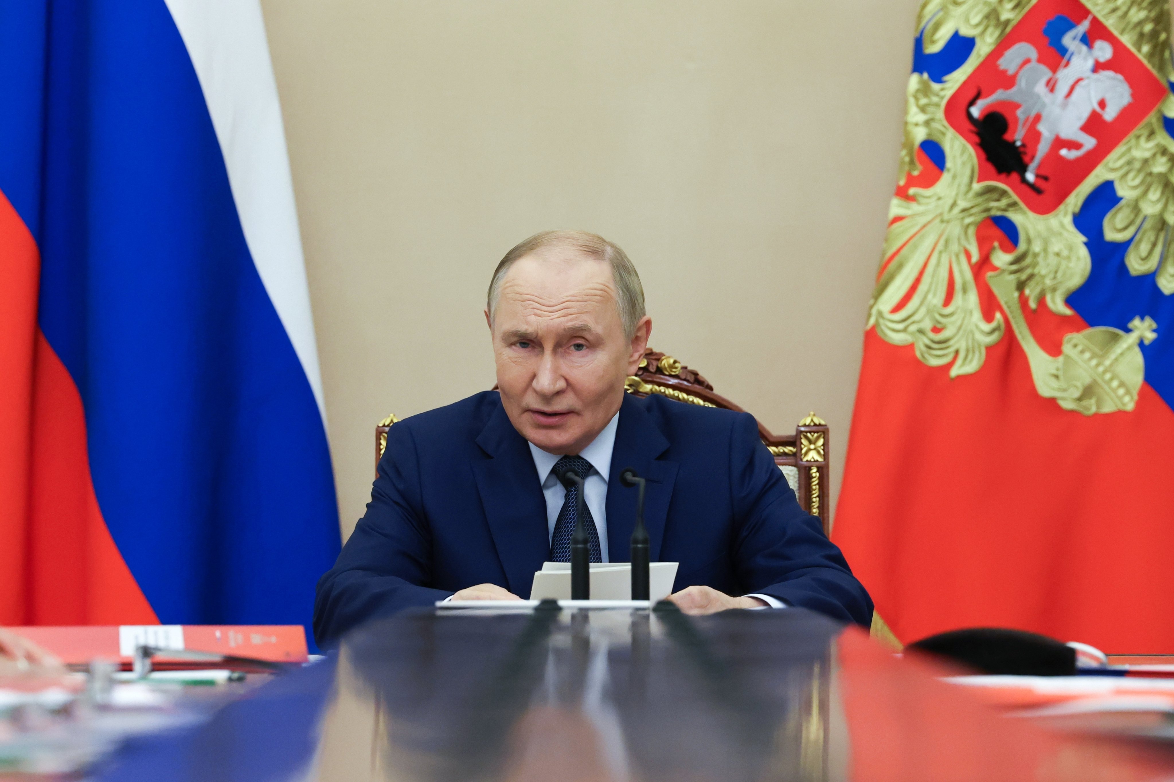 Russian President Vladimir Putin chairs a meeting with members of the Security Council at the Kremlin in Moscow on Monday. Photo: EPA/Kremlin