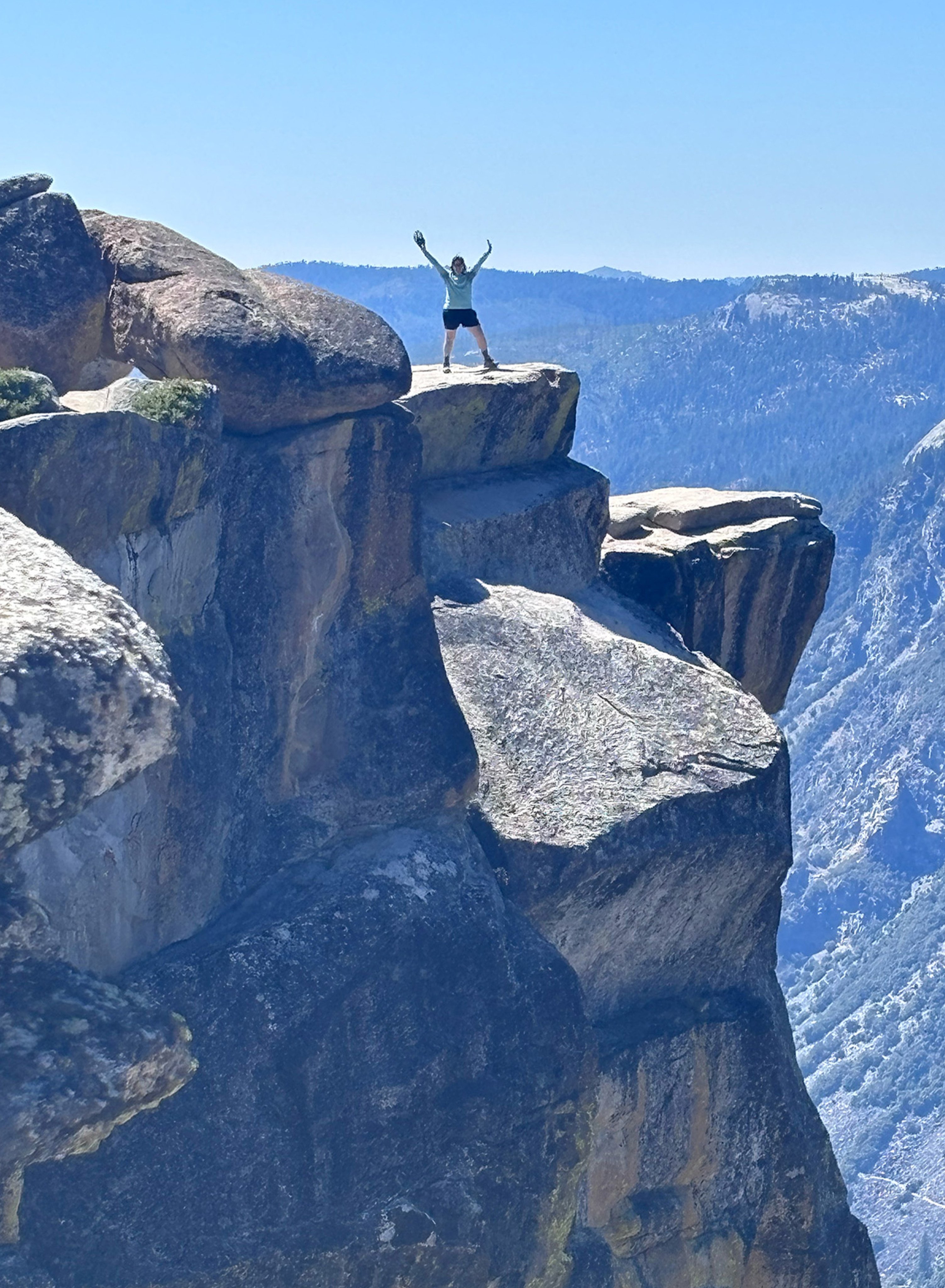 Wild writer Jaclyn Cosgrove celebrates their successful jaunt to Taft Point, an epic lookout point in Yosemite National Park. (Jaclyn Cosgrove/Los Angeles Times/TNS)