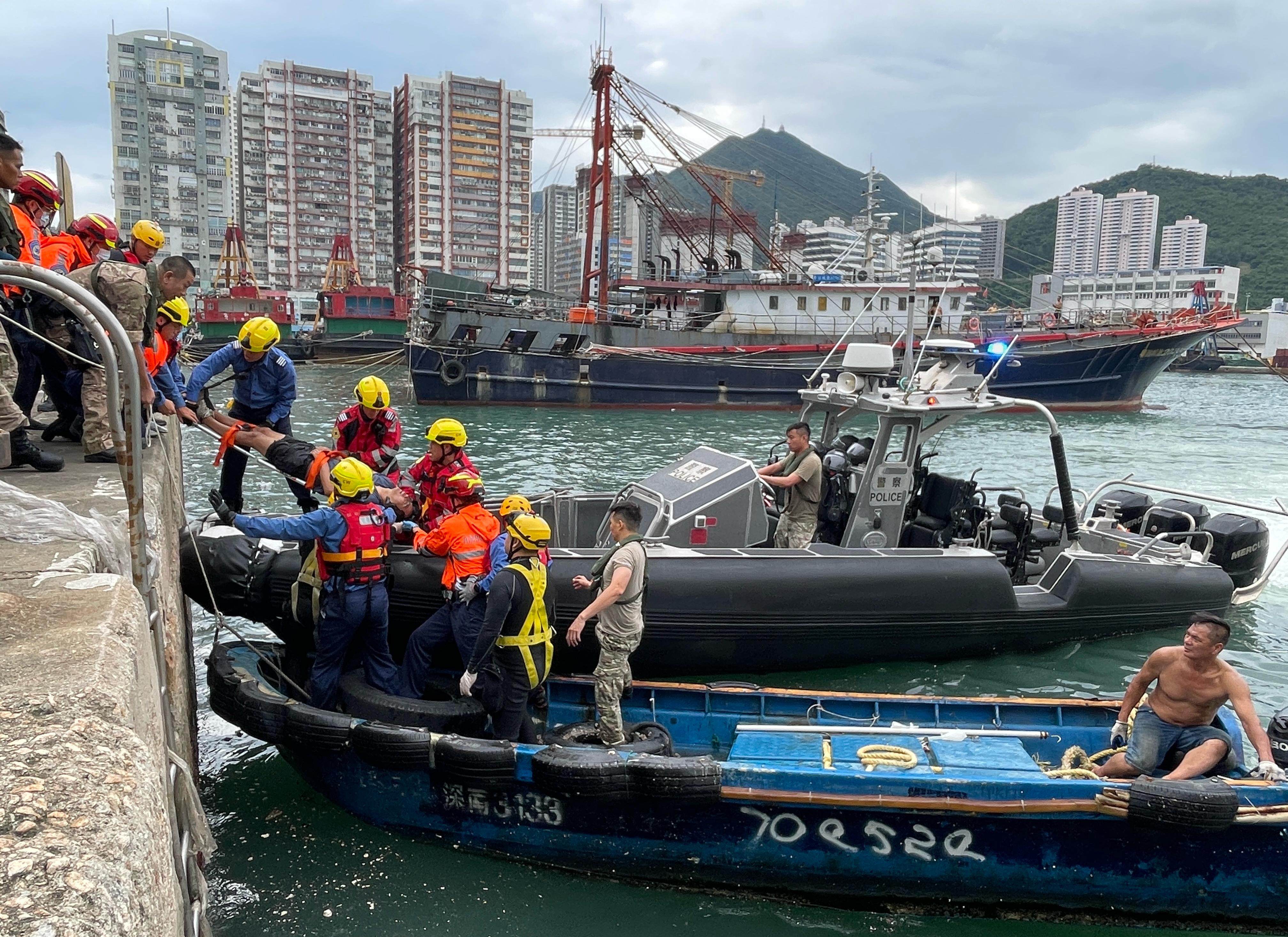 A man, woman and their five-year-old son had to be rescued from the sea after the latter two were swept in by a wave during the No 8 warning signal for Super Typhoon Ragasa. Photo: Handout