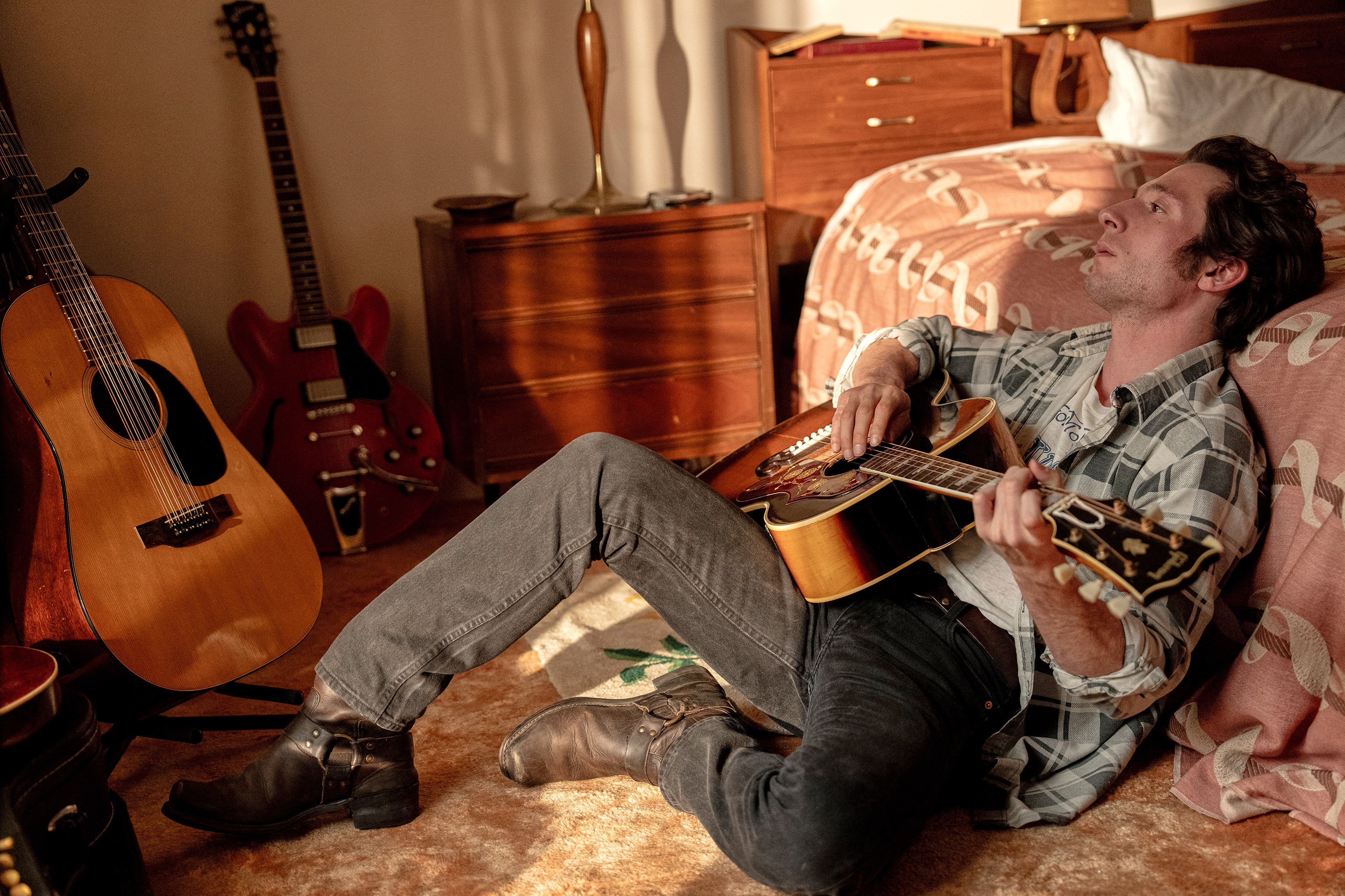 Jeremy Allen White as Bruce Springsteen in a still from the biographical musical drama film Springsteen: Deliver Me From Nowhere. The actor talks about embodying the singer, overcoming doubt, and finding his voice. Photo: 20th Century Studios via AP