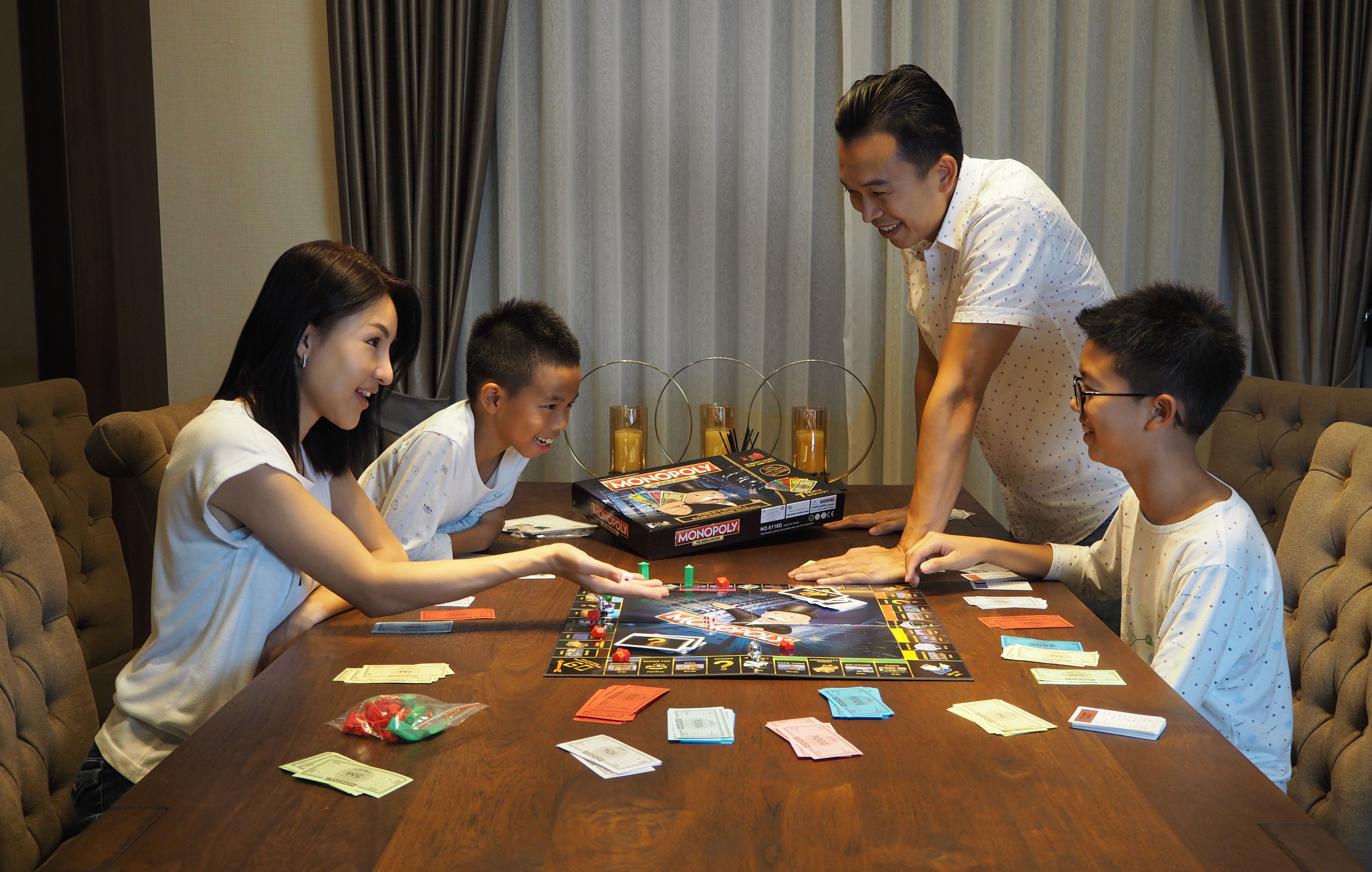 Monopoly is a classic board game that can be played during a typhoon with loved ones. Other fun activities include cooking and meditating. Photo: Shutterstock